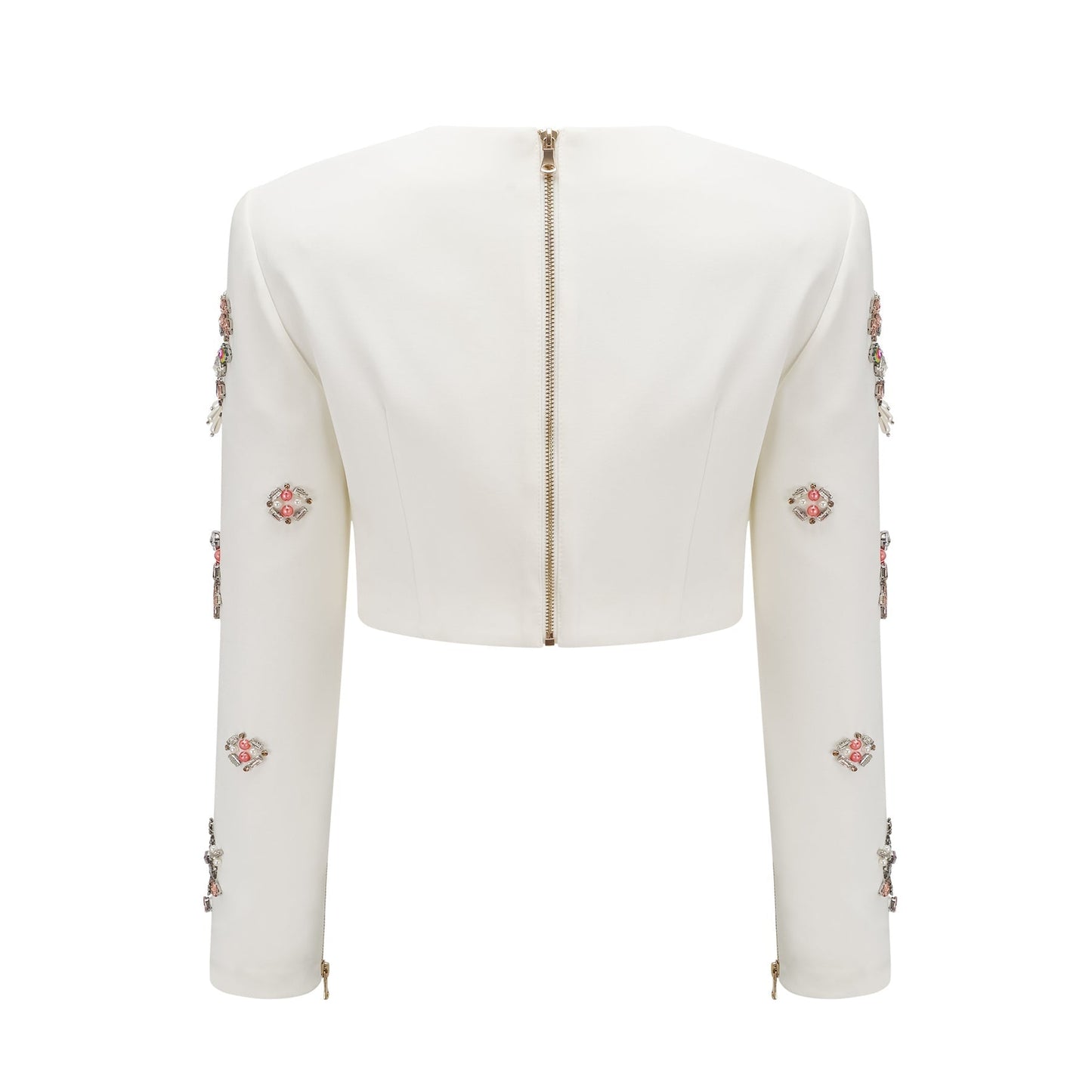 A white matching set consisting of a top and skirt adorned with crystal embellishments named Jeanne The outfit features a sleeveless top and a fitted skirt both decorated with sparkling crystals creating an elegant and sophisticated look