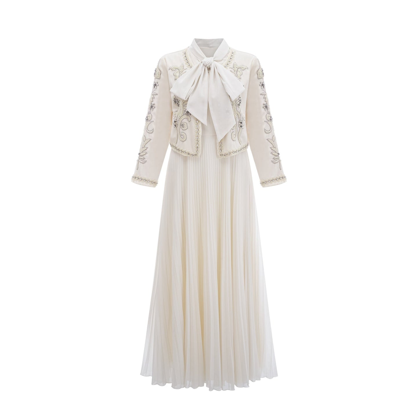 A white matching set featuring a pleated jacket with embellishments and a coordinating dress both in the Blanche style