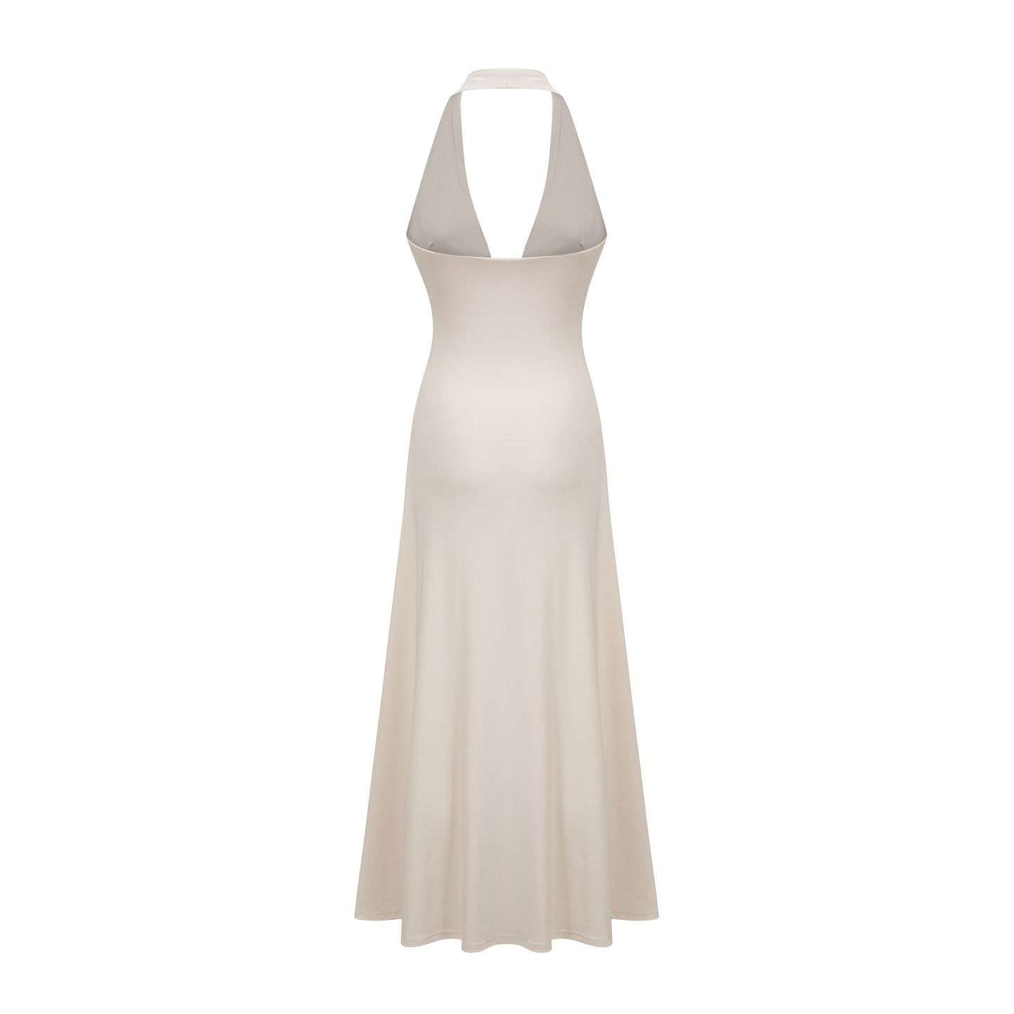 A white maxi dress with a deep V neckline and draped fabric worn by a model against a plain background