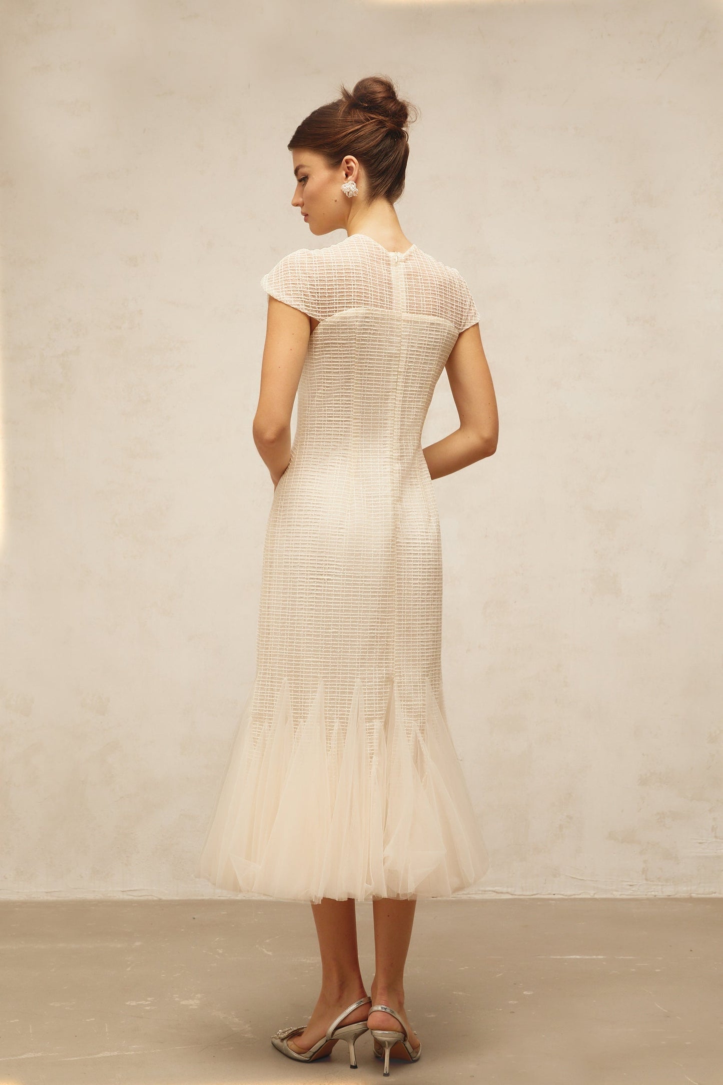 A white midi dress with jacquard fabric and tulle panels named Berengere