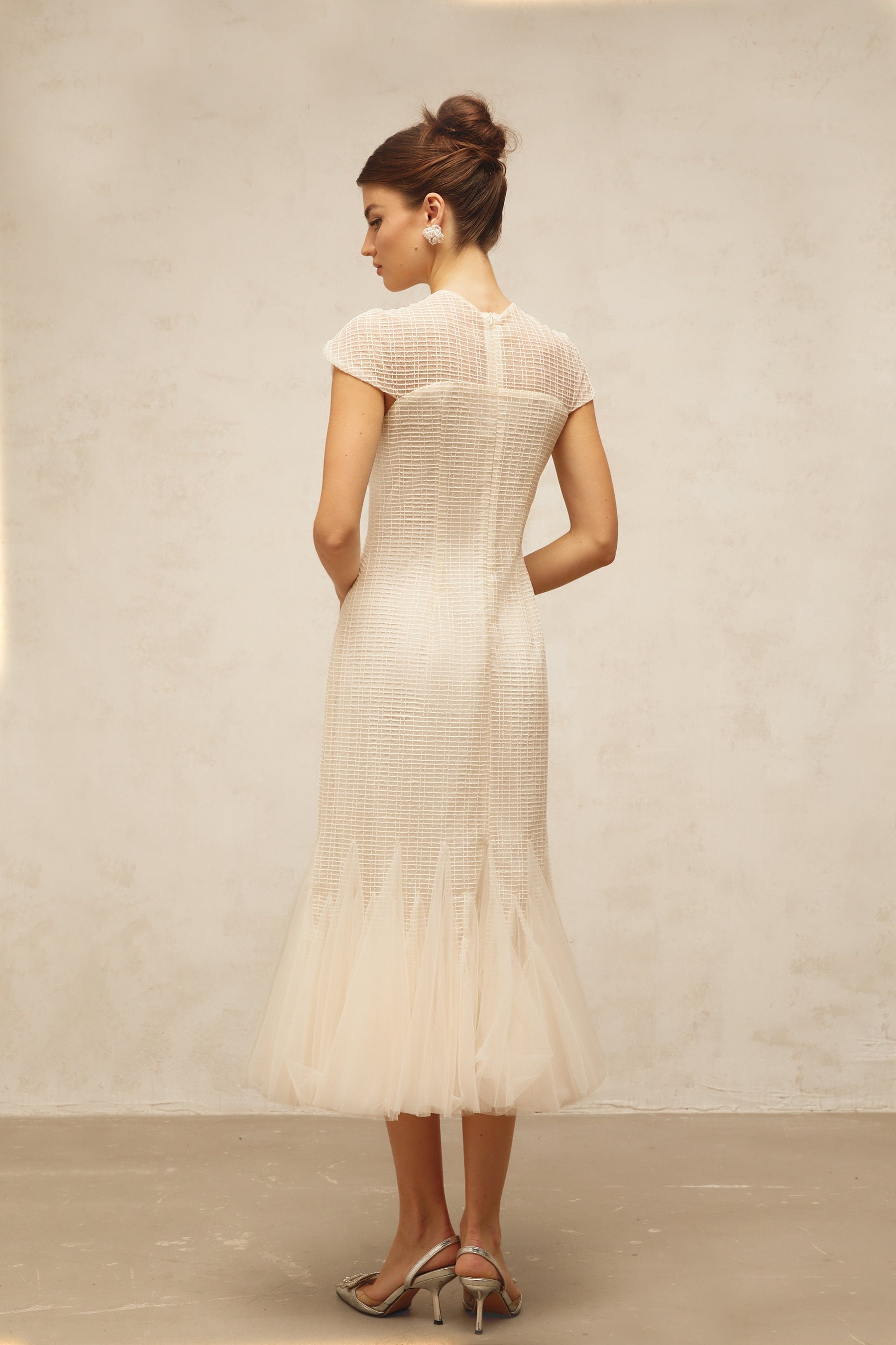 A white midi dress with jacquard fabric and tulle panels named Berengere
