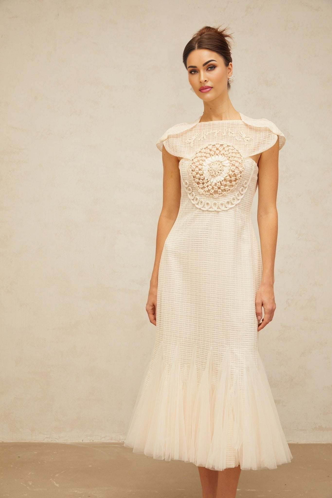 A white midi dress with jacquard pattern and tulle panels named Berengere