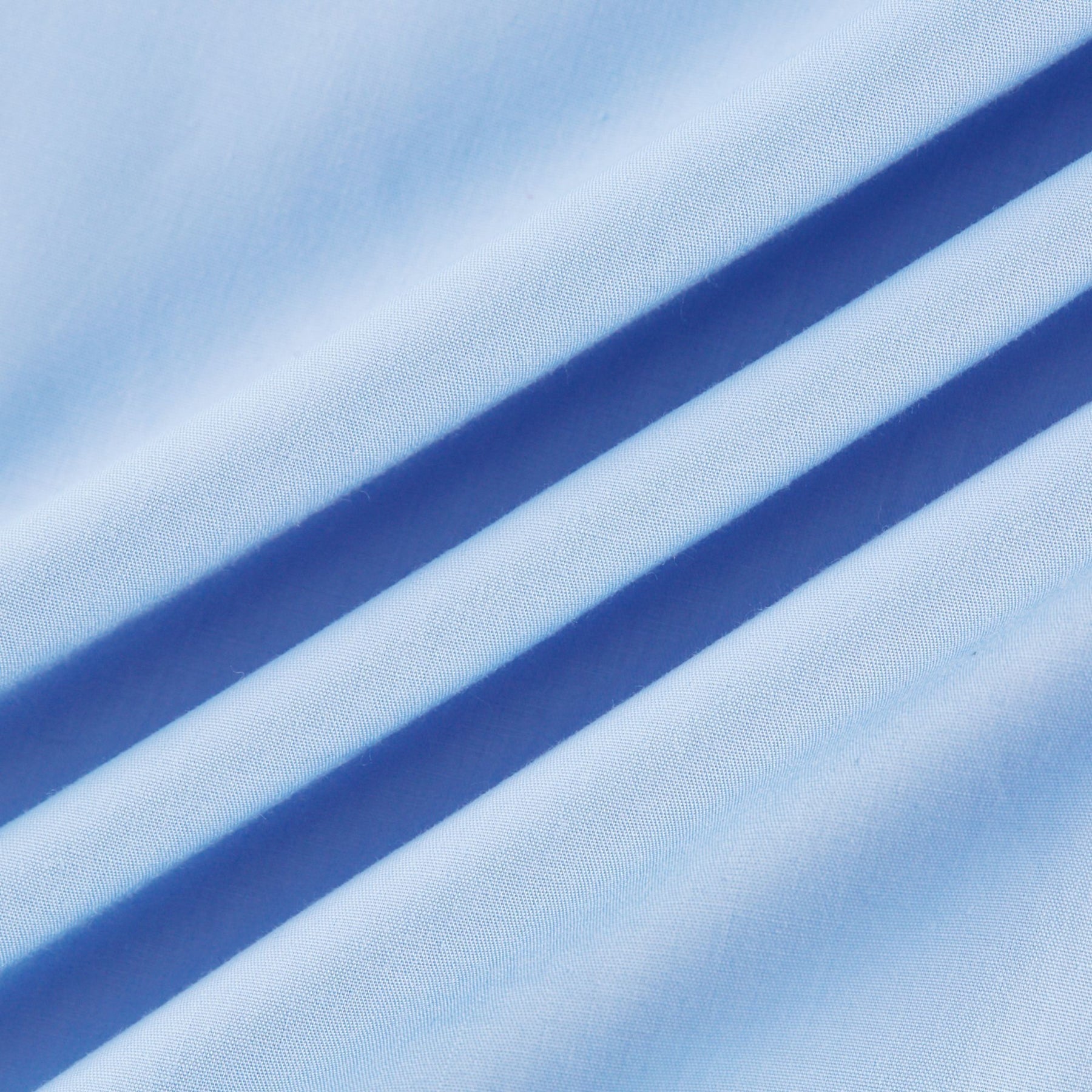 A white offshoulder midi dress with tiered layers and a flowy silhouette named Sophie