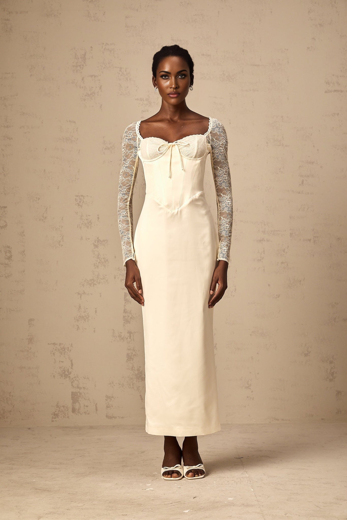 A white satin midi dress with lace panel detailing called Aurore