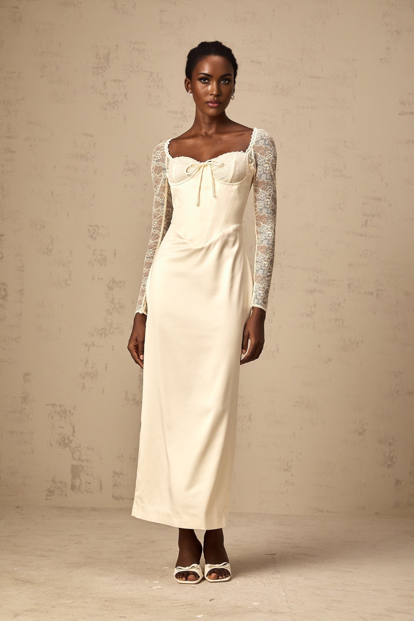 A white satin midi dress with lace panel details called Aurore