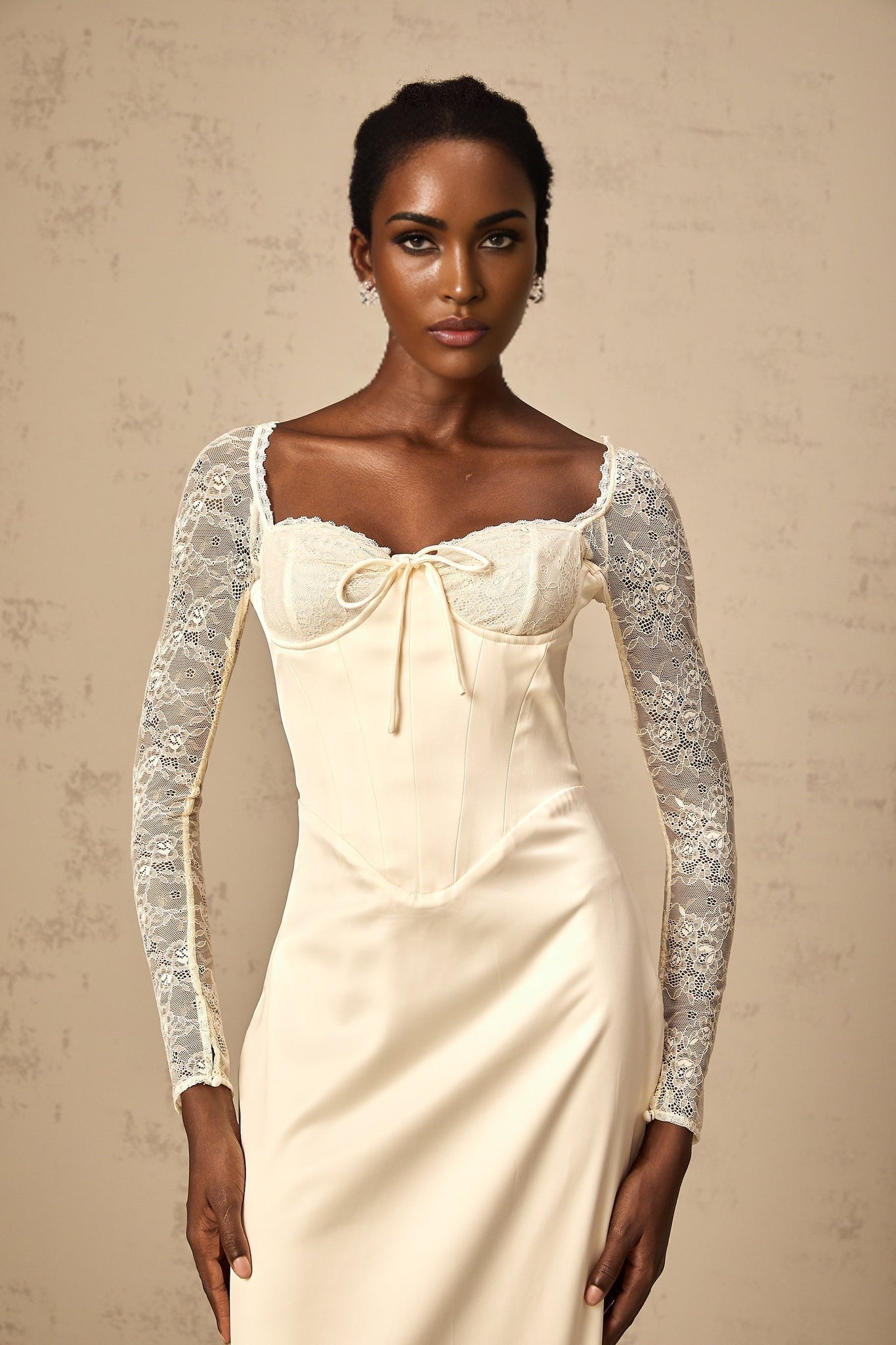 A white satin midi dress with lace panel details named Aurore