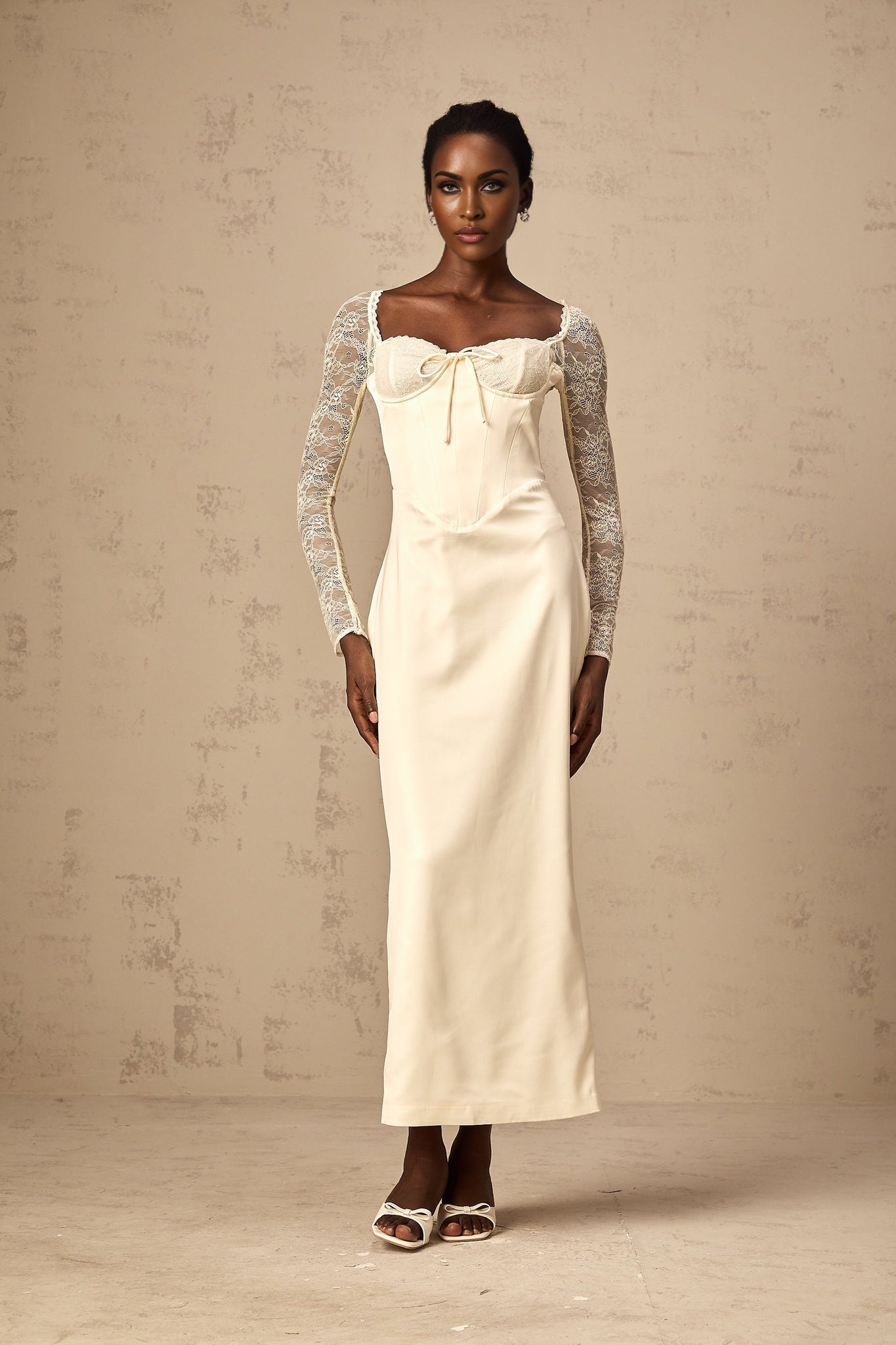 A white satin midi dress with lace panel details named Aurore