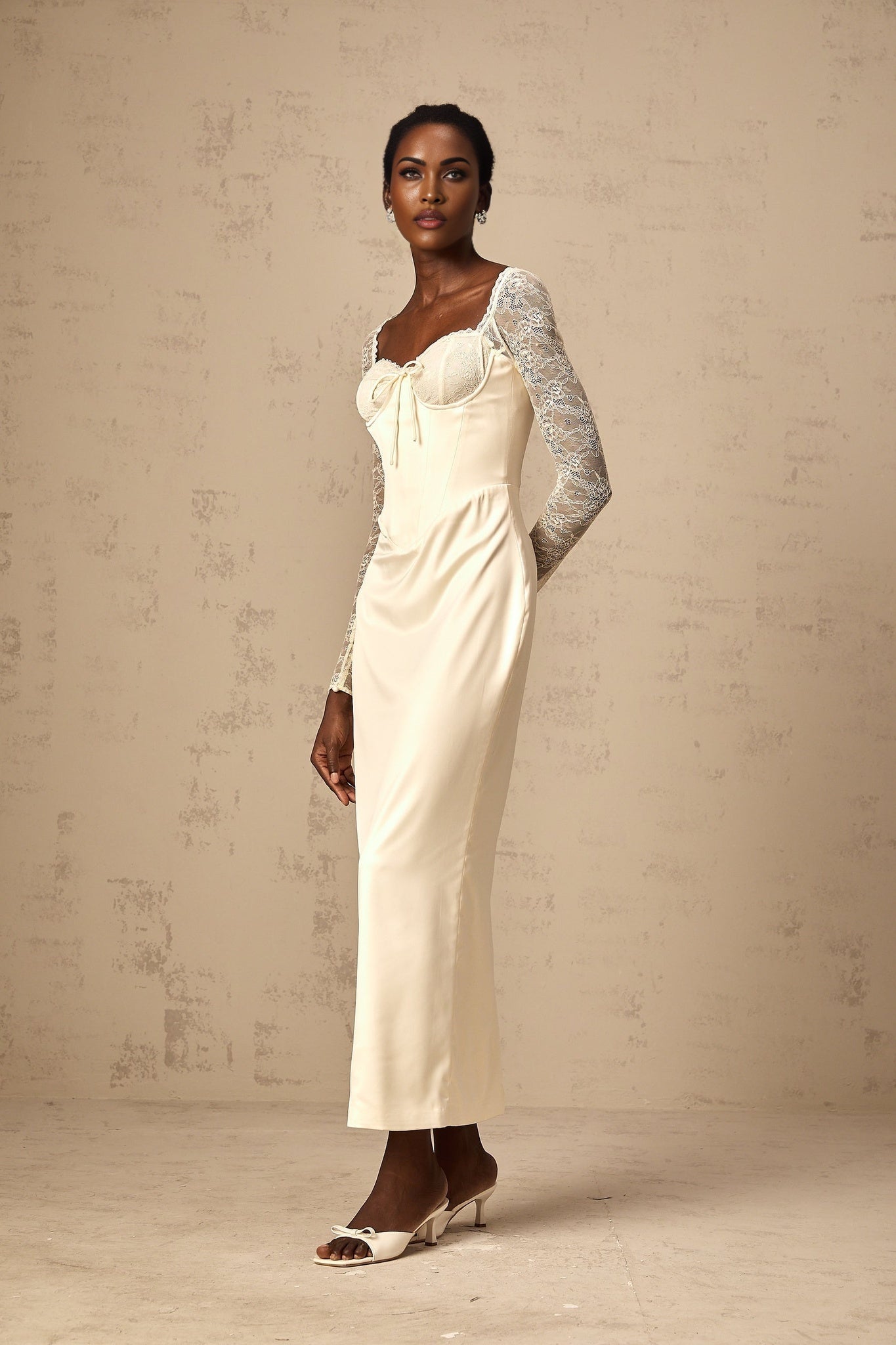 A white satin midi dress with lace panel details named Aurore