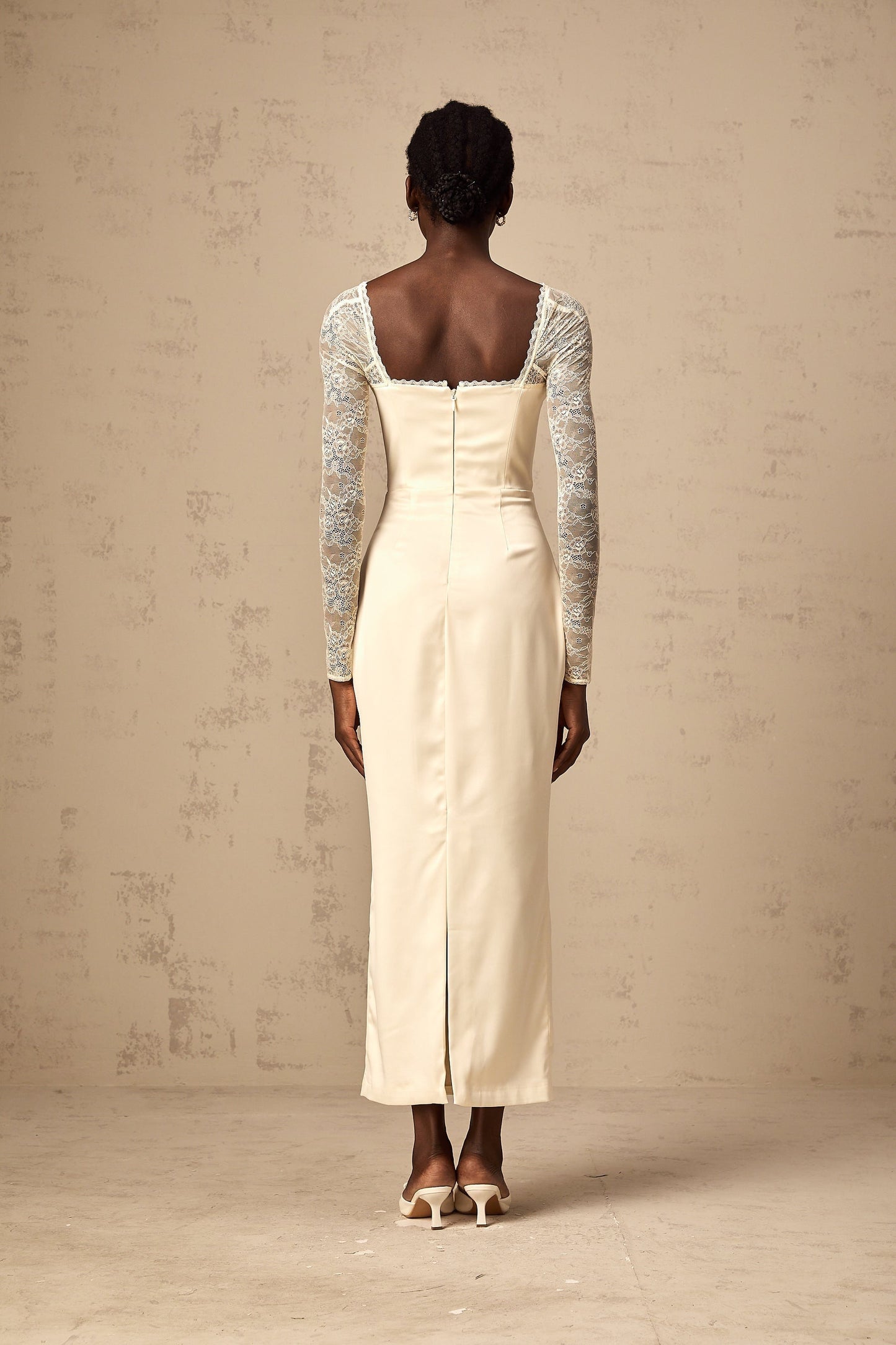 A white satin midi dress with lace panel details named Aurore