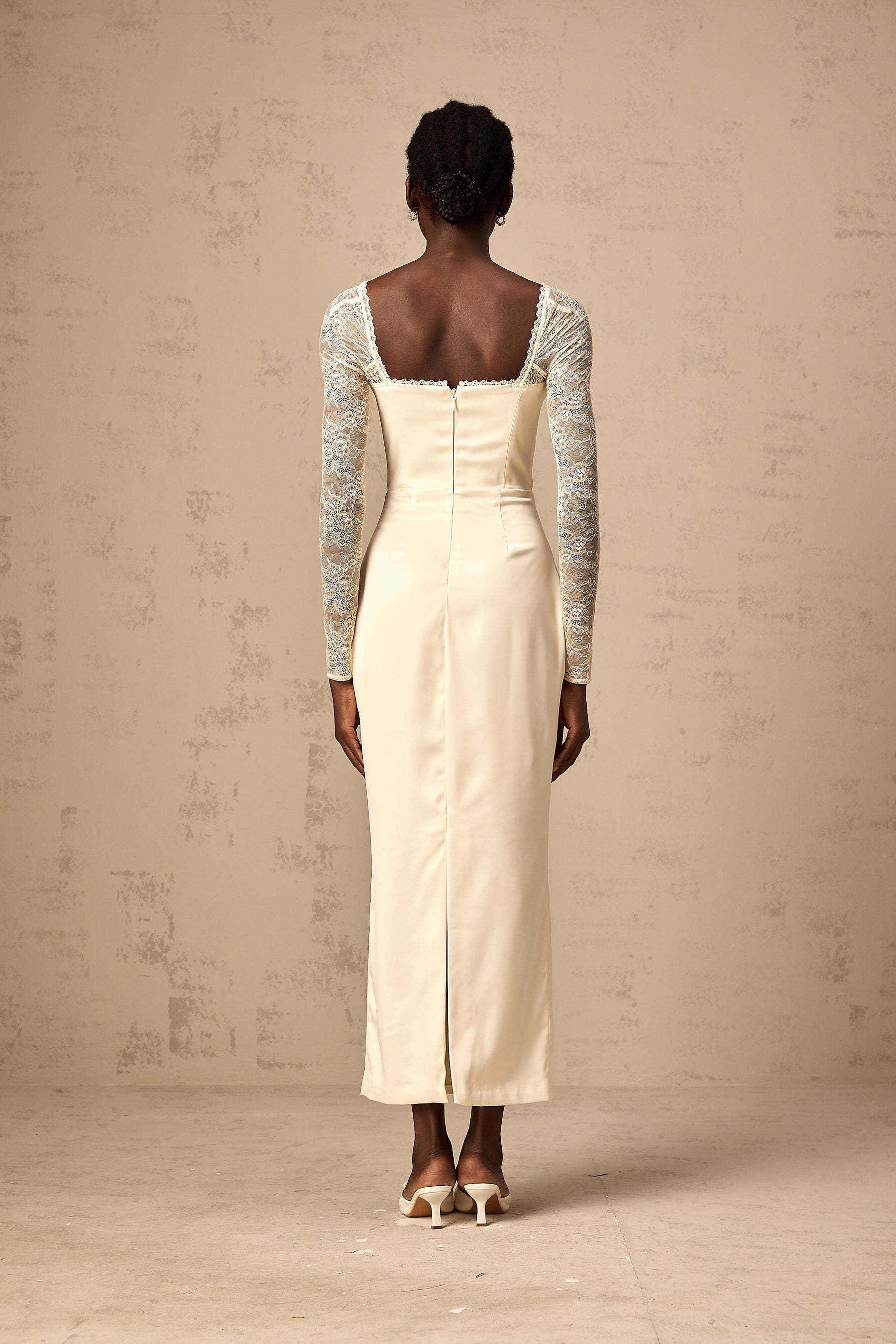 A white satin midi dress with lace panel details named Aurore