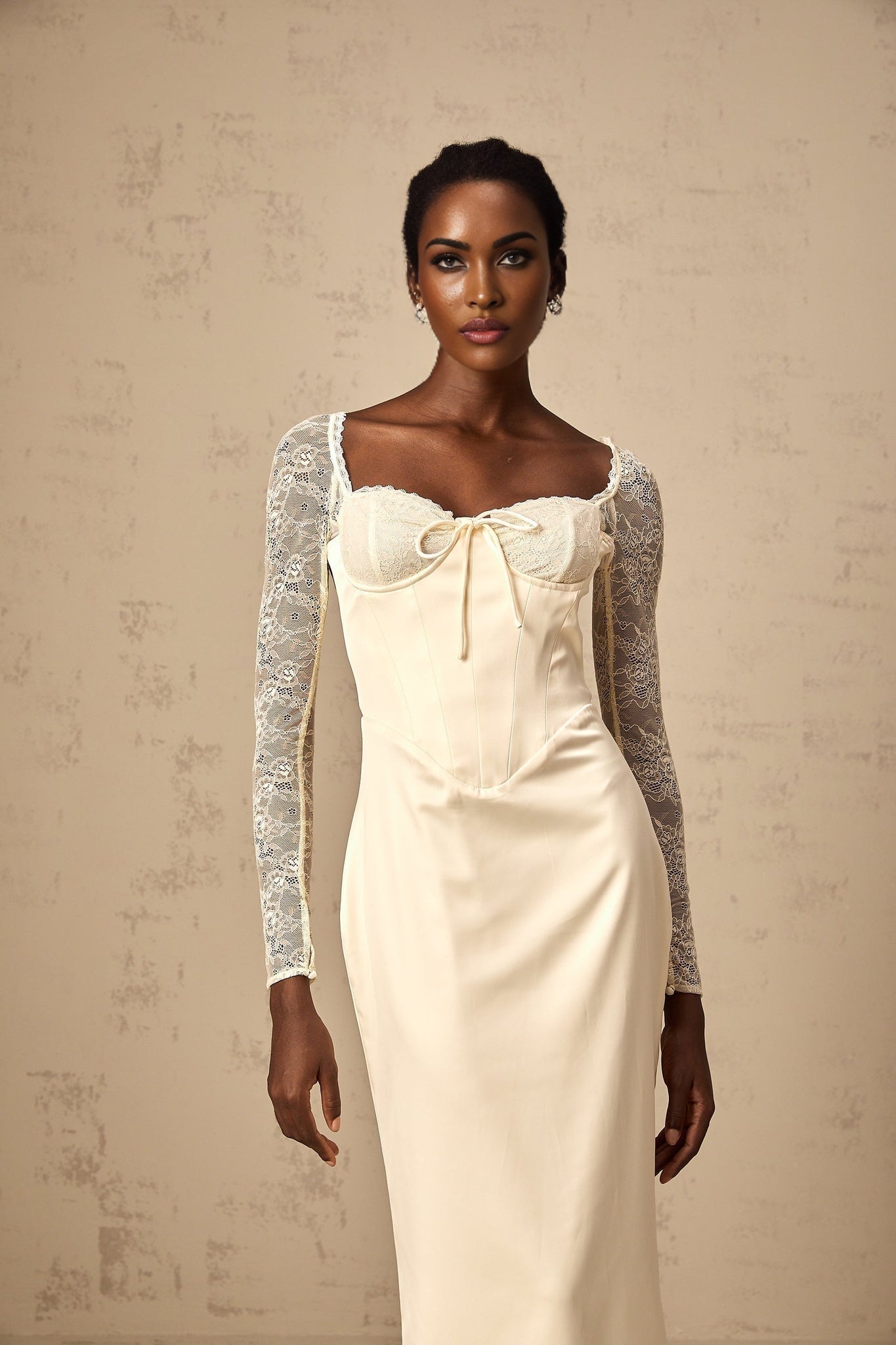 A white satin midi dress with lace panel details named Aurore