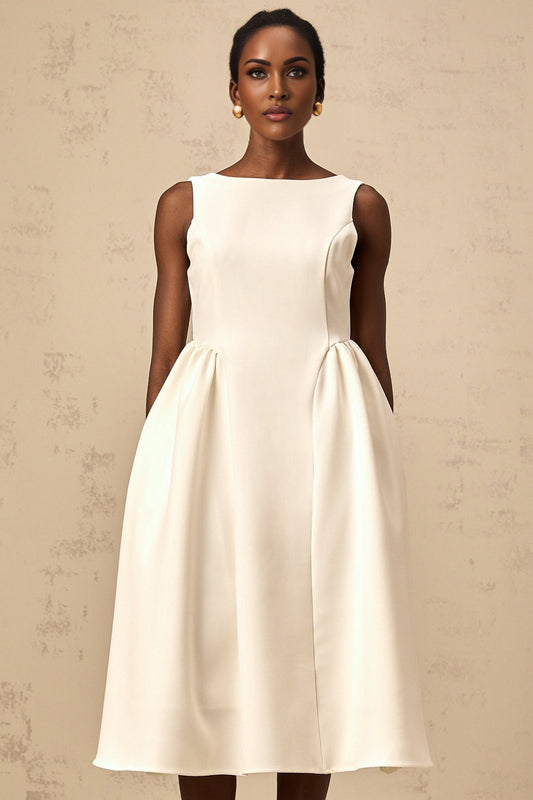 A white sleeveless midi dress with a full skirt worn by a model named Yolanda