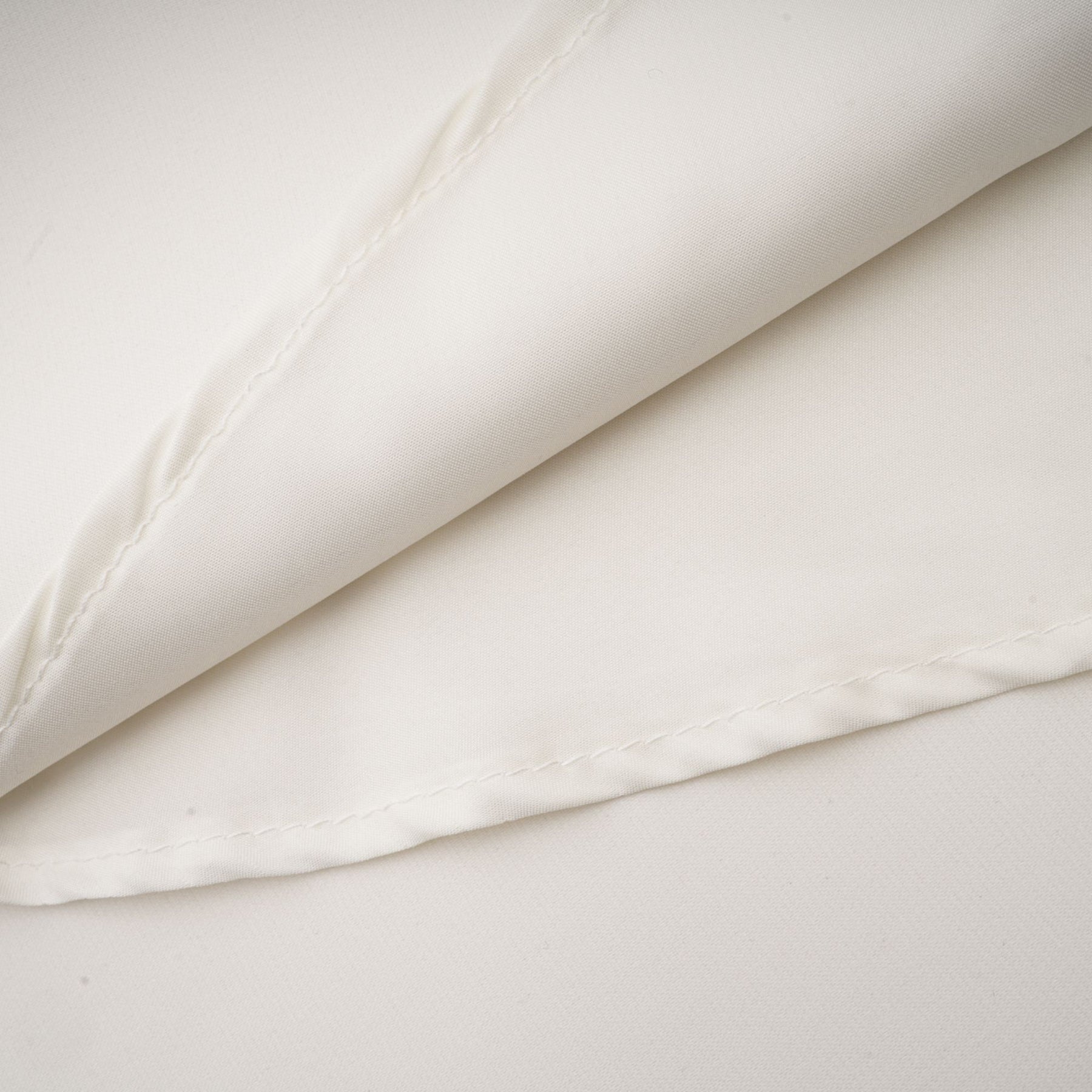 A white sleeveless midi dress with floral applique details named Emilie