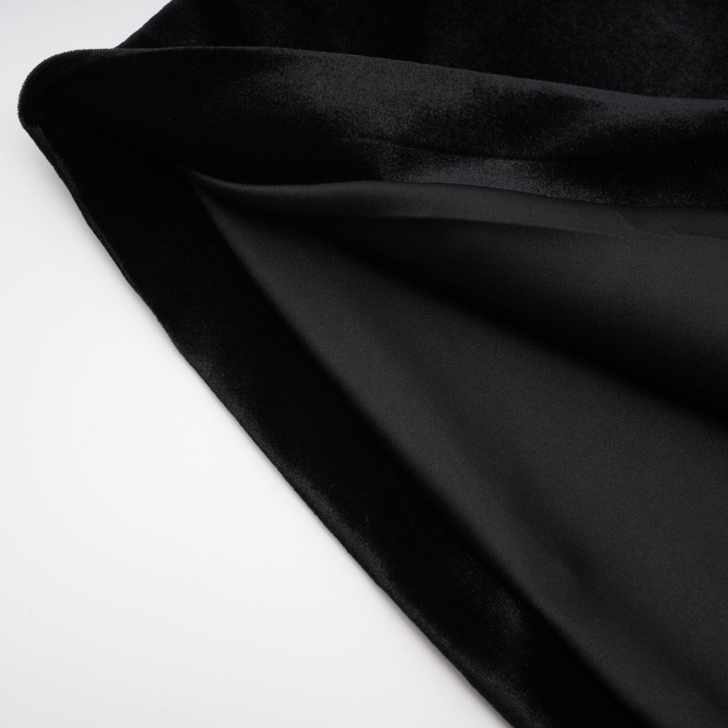 Black sleeveless anklelength dress with embellished crystal turtle neck rear zip fastening and side slit 100% Polyester