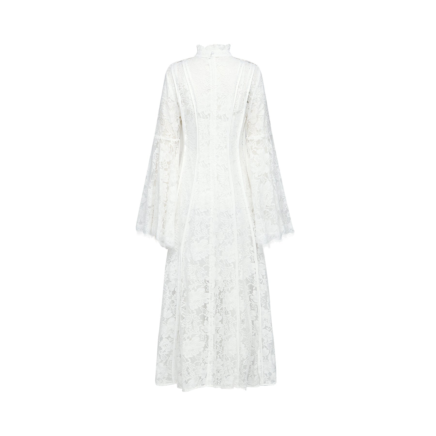 A woman wearing a Celine midi dress made of lace fabric with cutout details