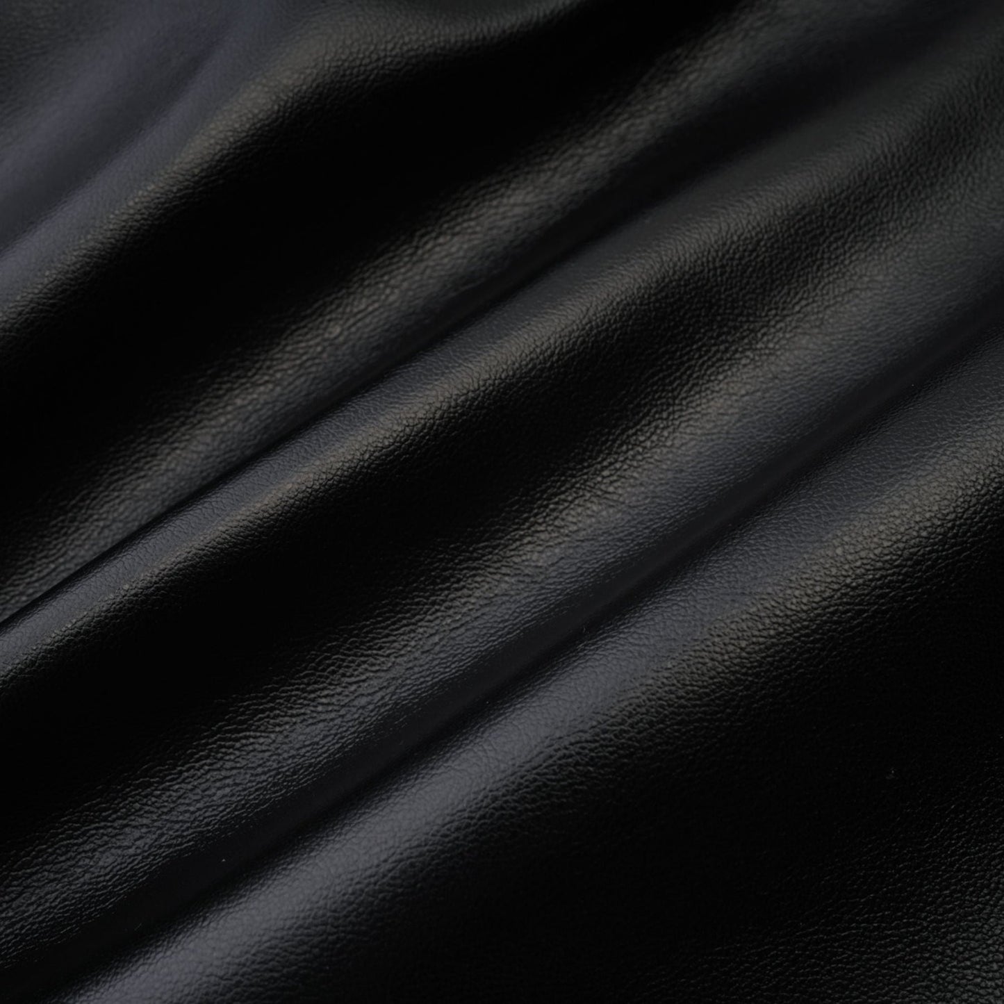 Dress in captivating Black with bustier style mesh detailing fauxleather finish and asymmetrical design Rear zip closure 75% Polyester 20% Cotton 5% Spandex