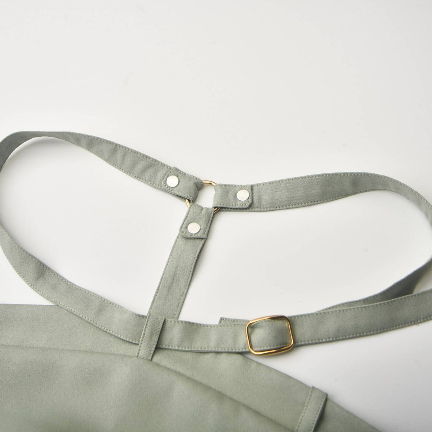 Forest green halterneck dress with open back pleat detailing and voluminous skirt Features delicate spaghetti straps and an asymmetric hem with goldtone hardware Made from 100% cotton