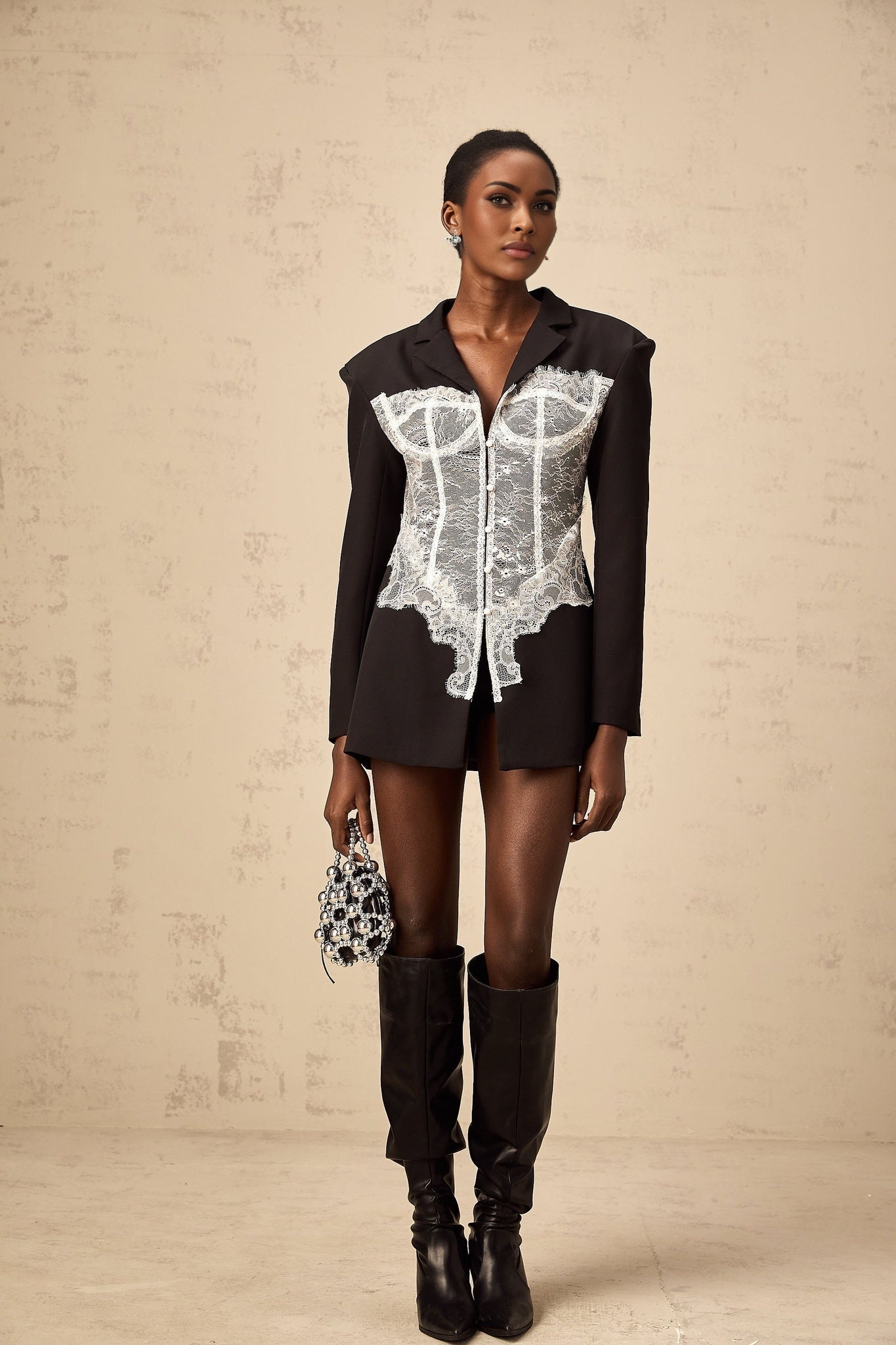 A womens blazer featuring color blocking and lace panels named Alexia