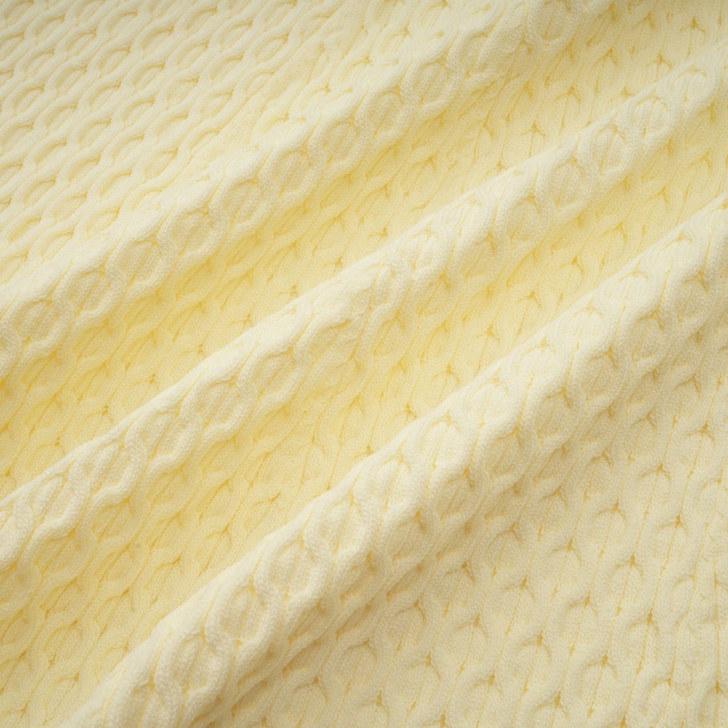 A yellow knitted dress with a sailor collar featuring a classic Madeleine style