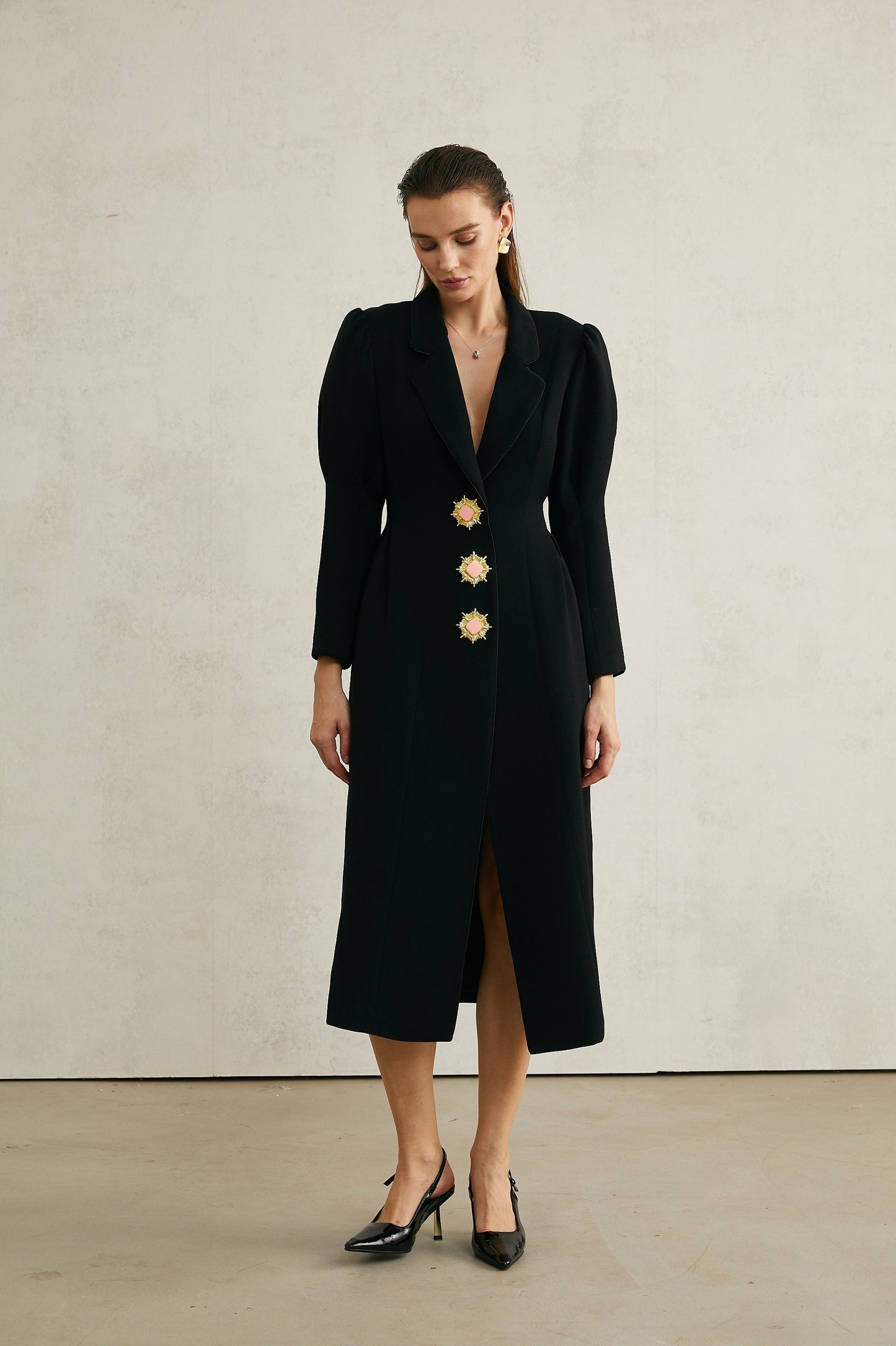 Alt text Black single breasted long coat by Aelle