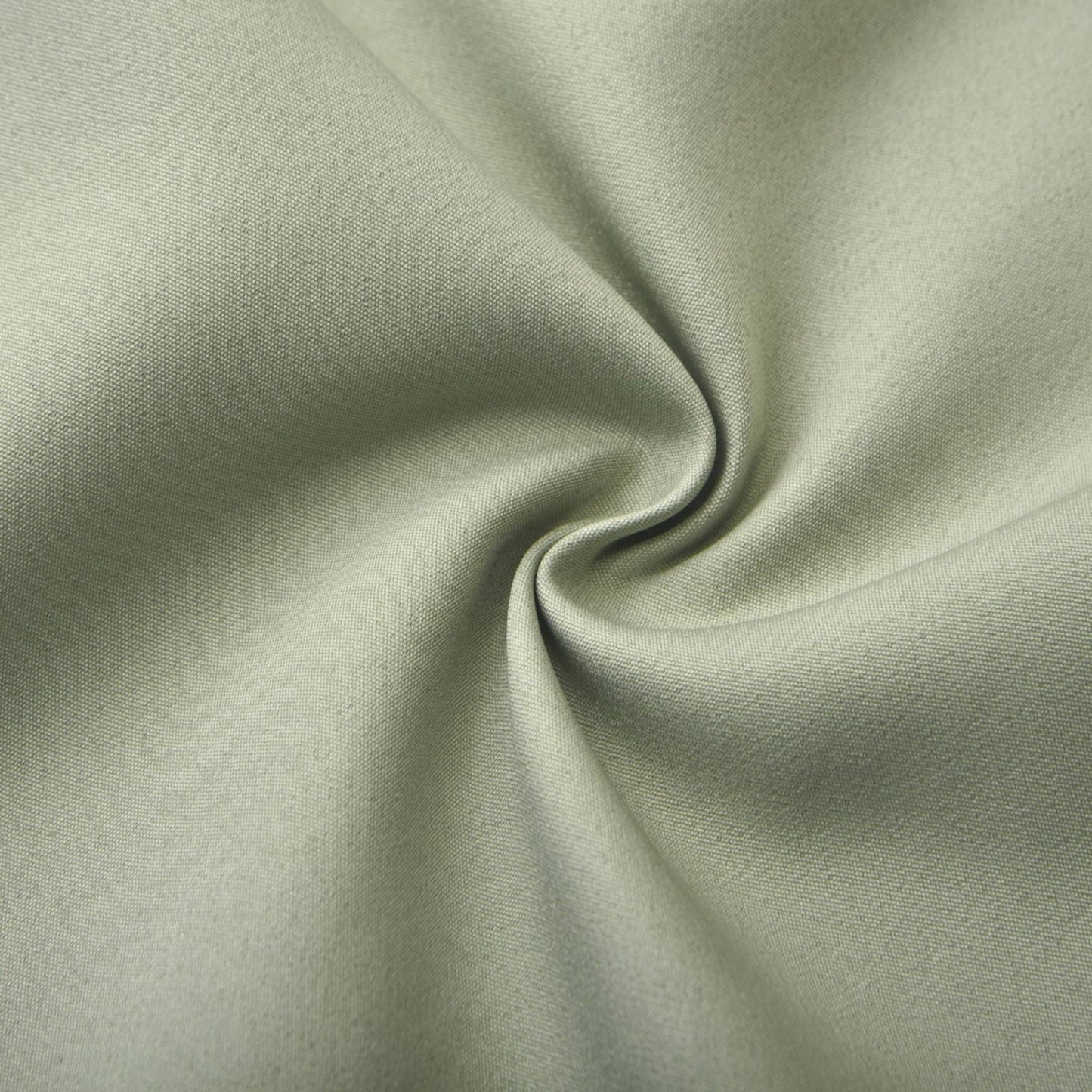 Green halterneck dress with open back pleat detailing and voluminous skirt