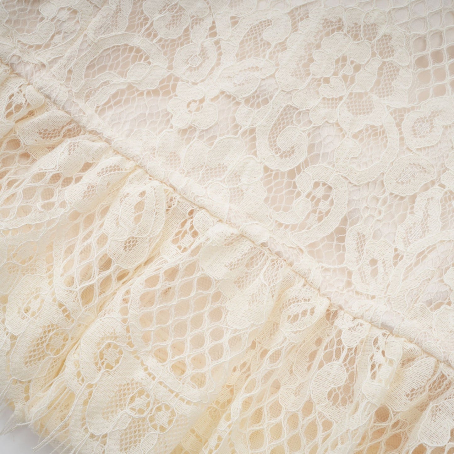 Anaelle off white blouse with bowknot detail and floral lace pattern