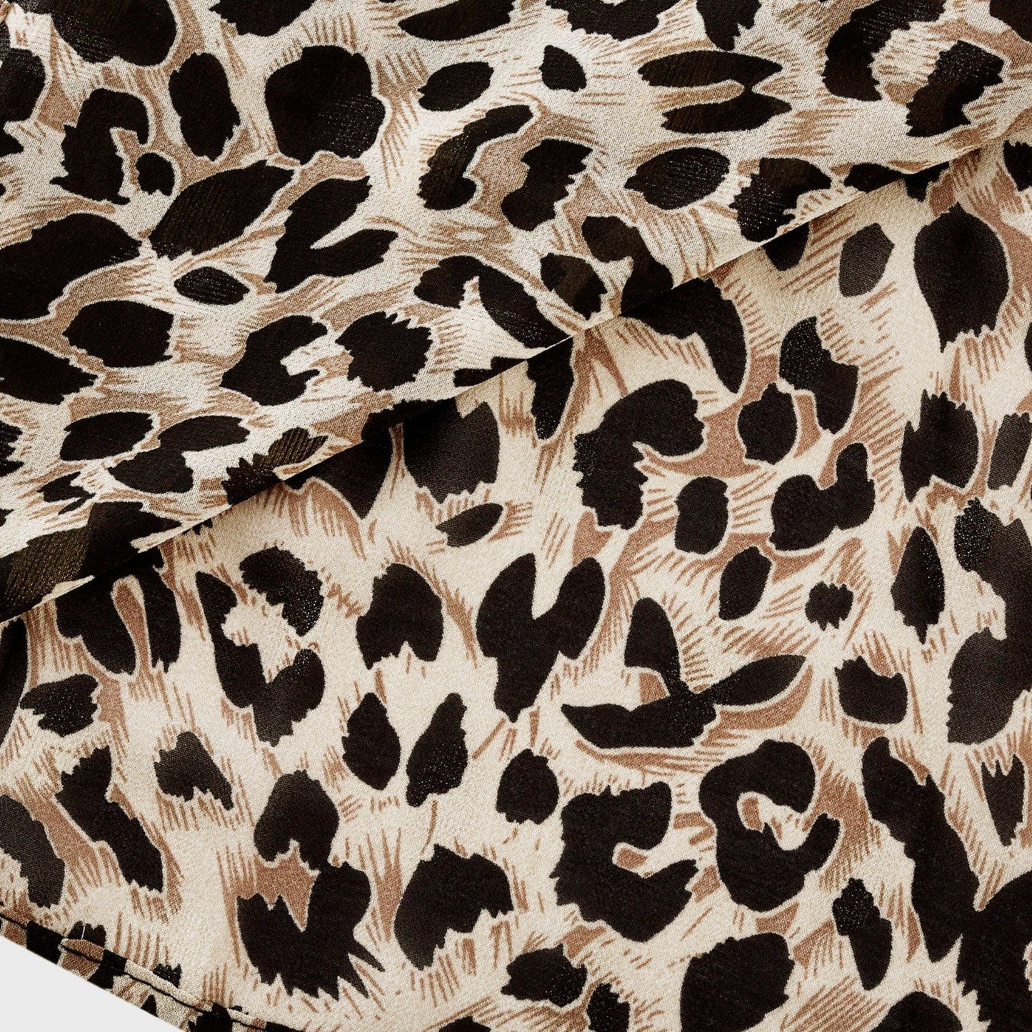 Angélique Vneck leopardprint midi dress