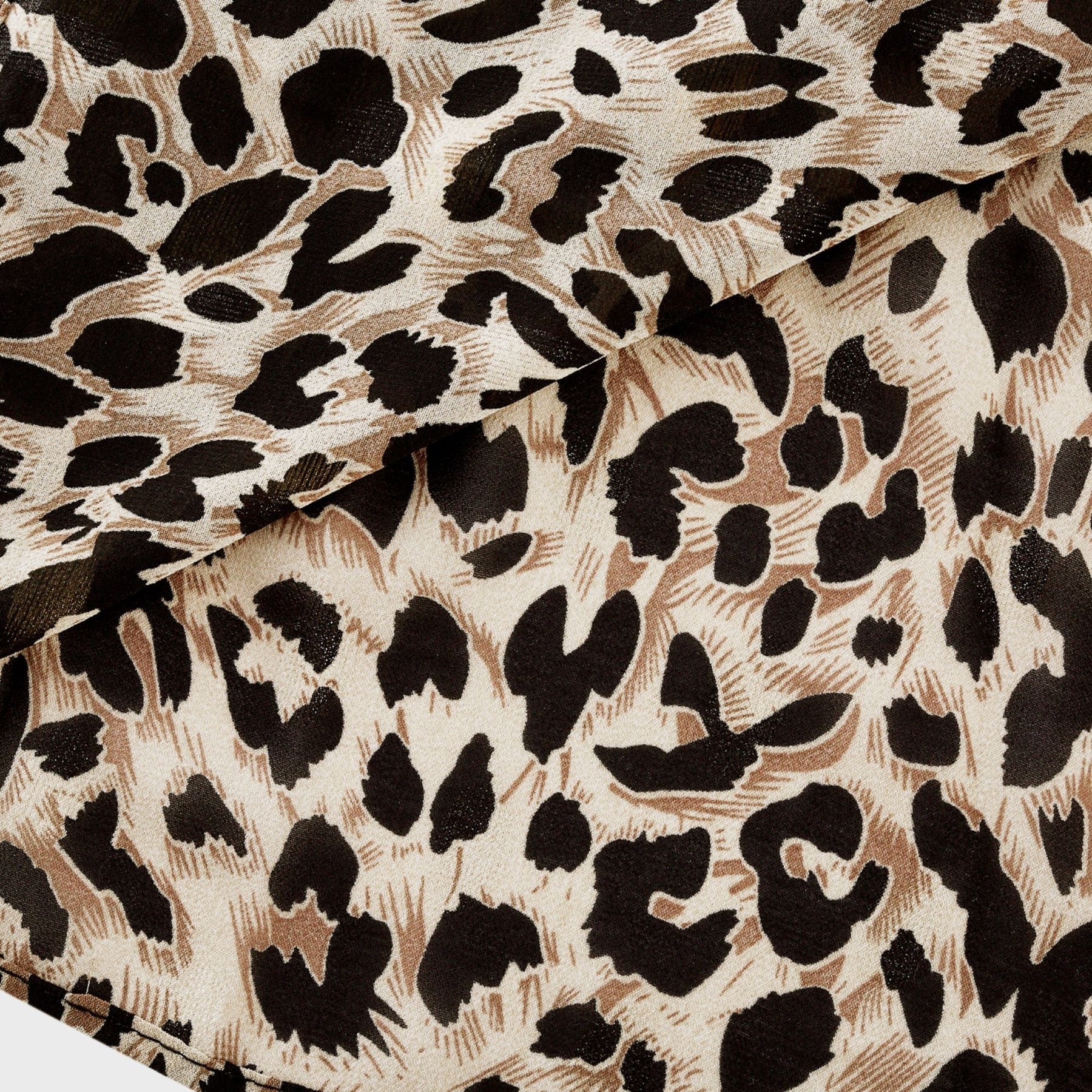 Angélique Vneck leopardprint midi dress