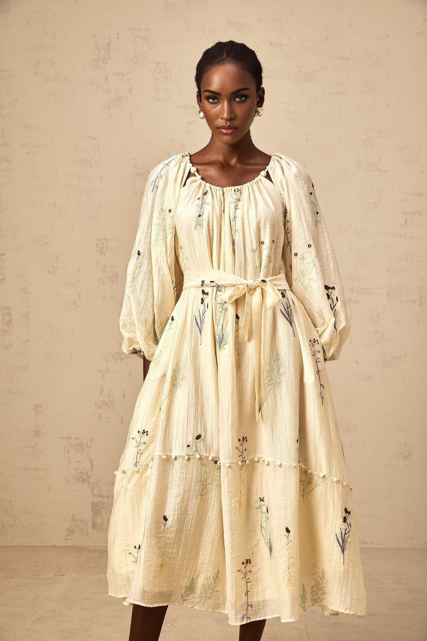 Beige midi dress with floral embroidery and beaded details featuring Uranie design