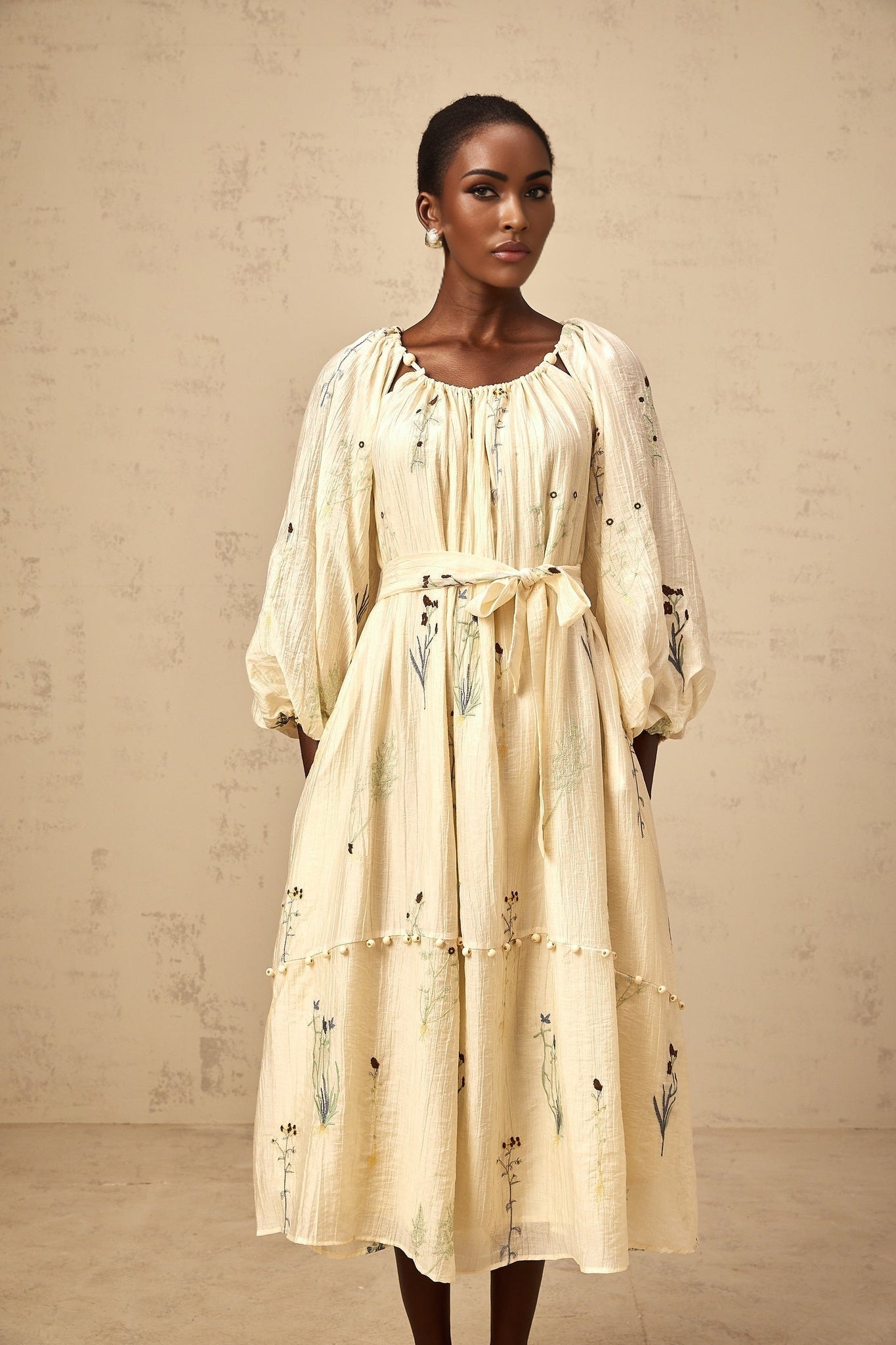 Beige midi dress with floral embroidery and beaded details featuring Uranie design
