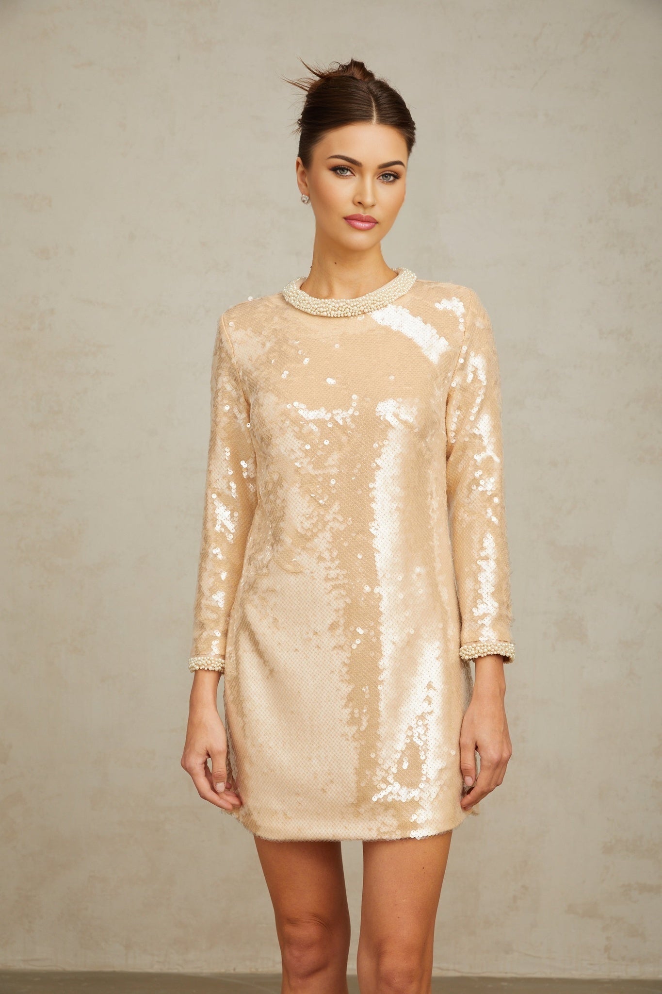 Beige mini dress with faux pearl and sequin embellishments