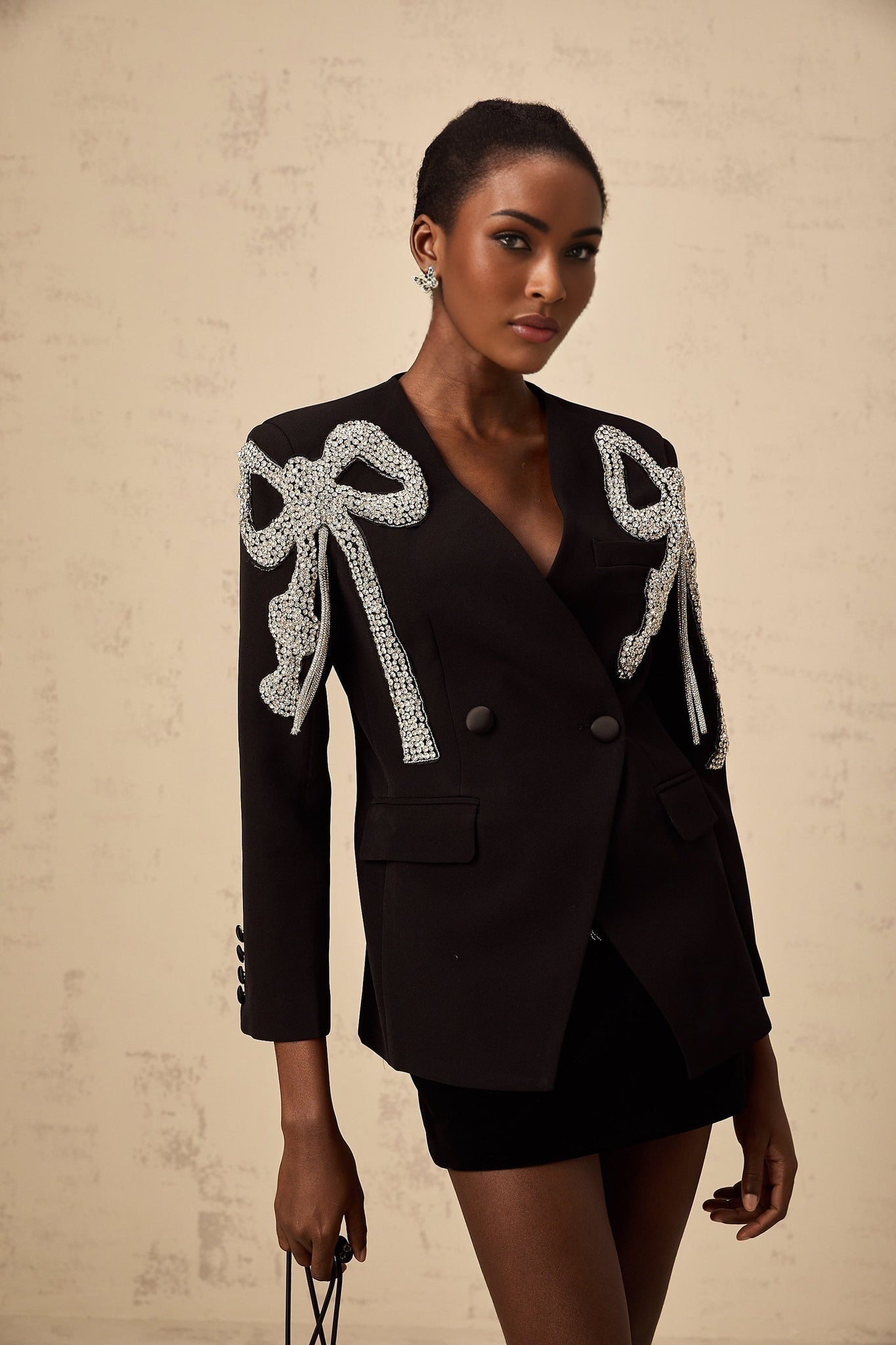 Black blazer with bow motif embellishment named Vanessa
