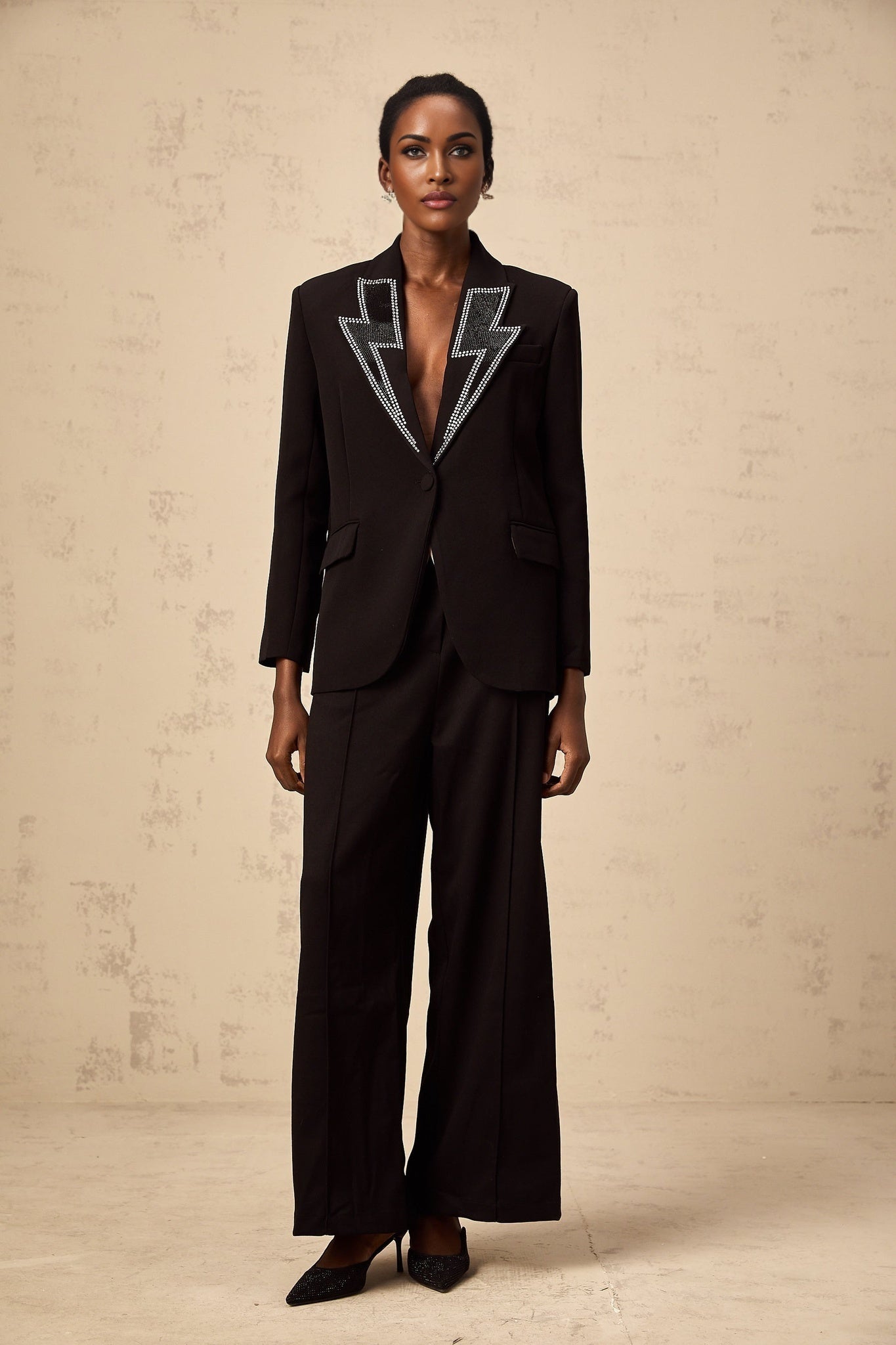 Black blazer with crystal embellishments in lightning pattern