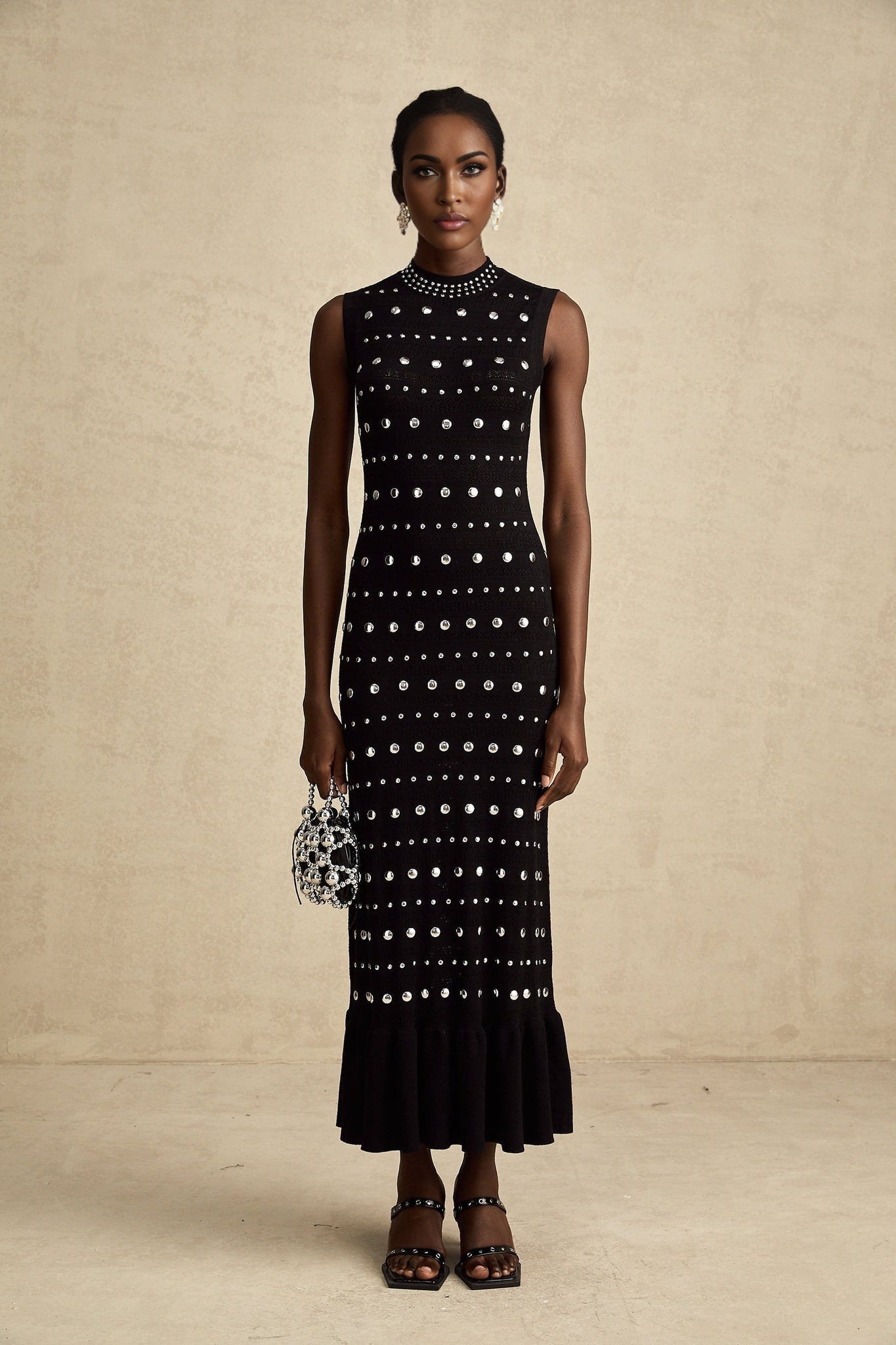 Black crochet knit maxi dress with studs by Chloe