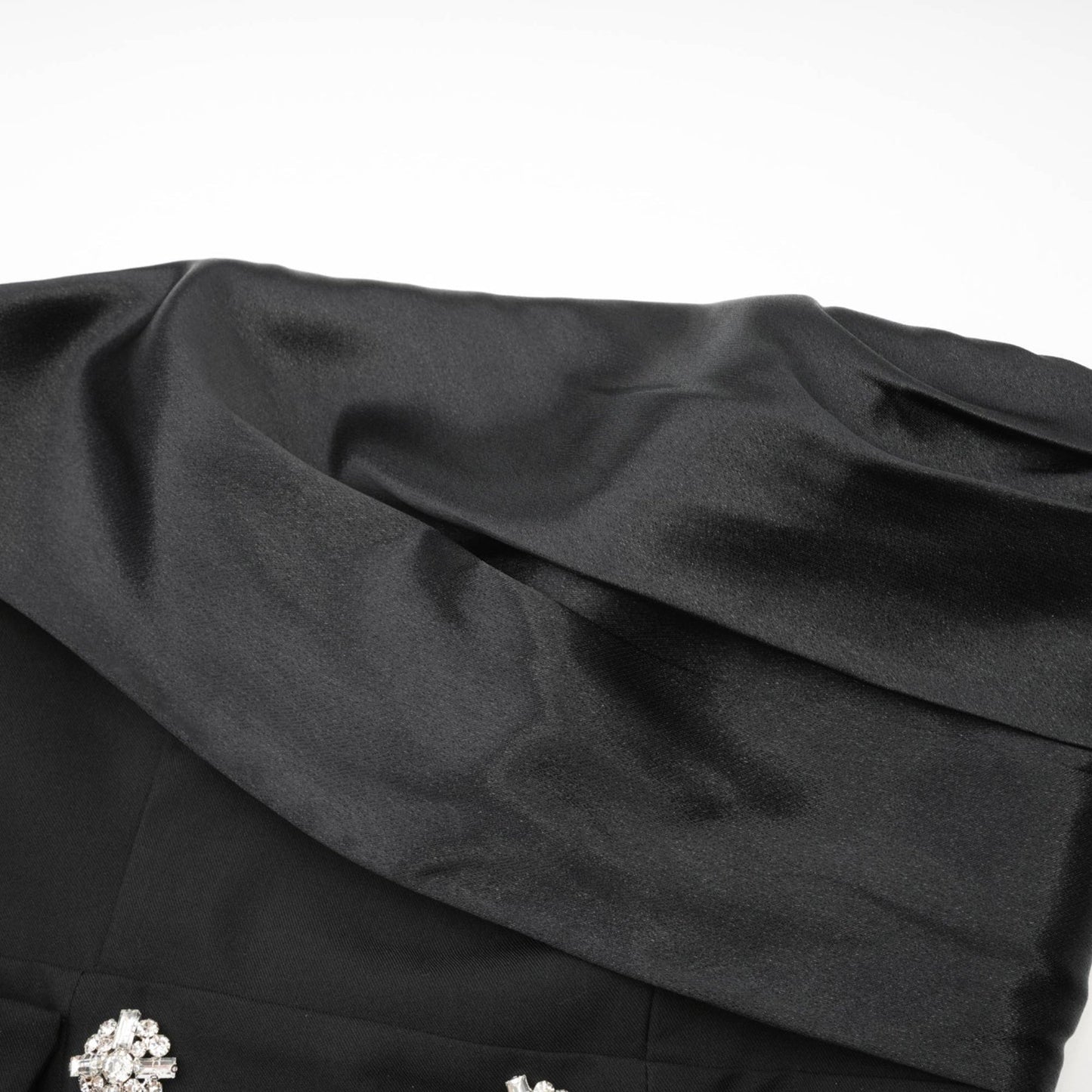 Black flared mini dress with crystal buttons named Mealla