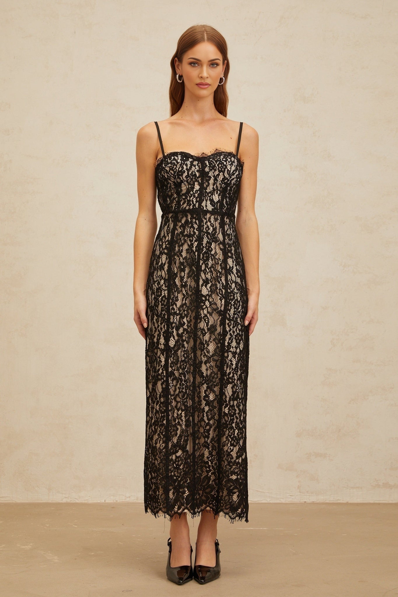 Black floral lace bustier style maxi dress with sweetheart neckline and adjustable spaghetti straps