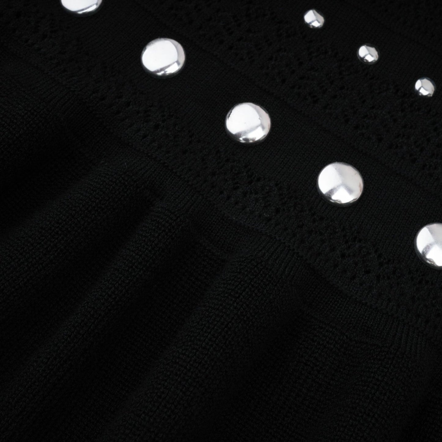 Black maxi dress with crochet knit pattern and stud embellishments by Chloe