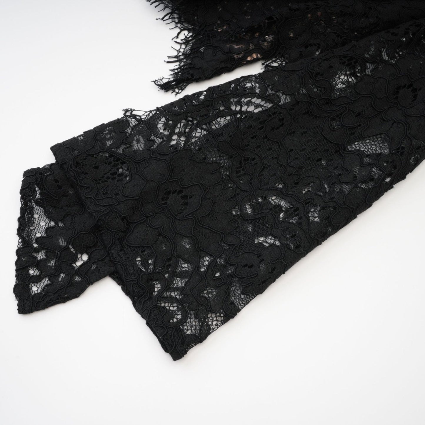 Black mini dress with lace trim featuring Kylitha design