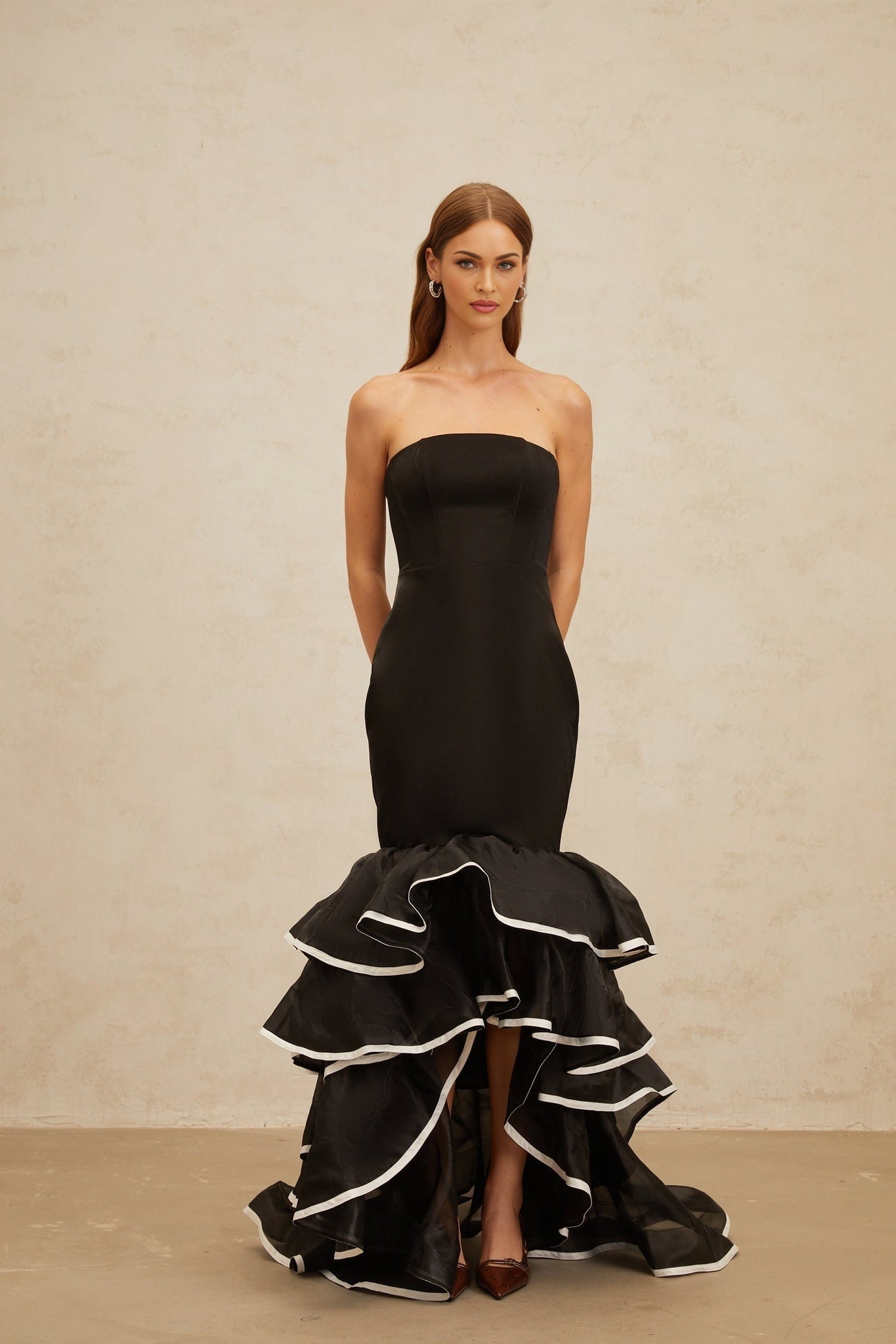 Black off the shoulder sleeveless maxi dress with ruffled detailing and mermaid hem