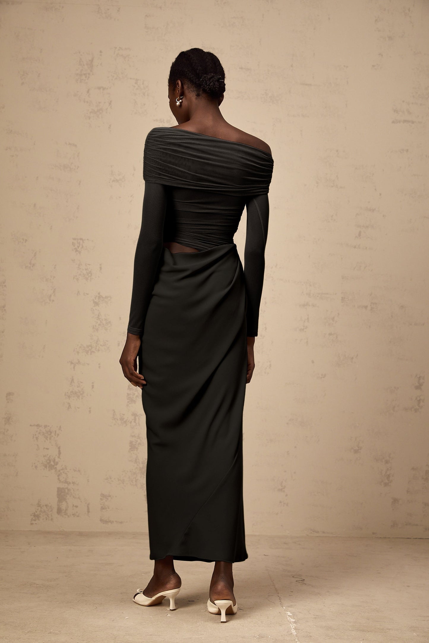 Black offshoulder midi dress with semisheer fabric and flowy silhouette