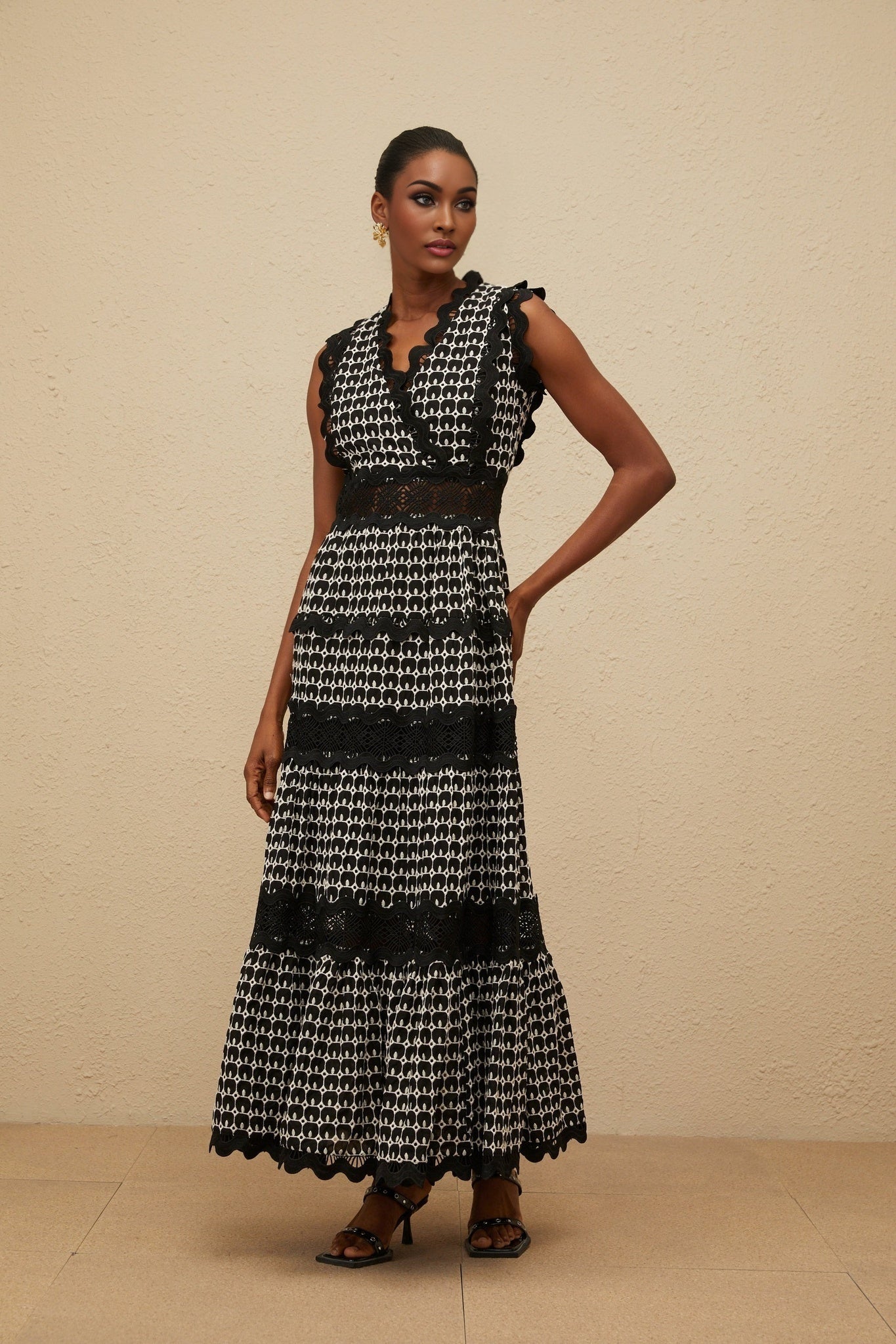Black Sleeveless V-Neck Maxi Dress with Cut-Out and Lace Detail
