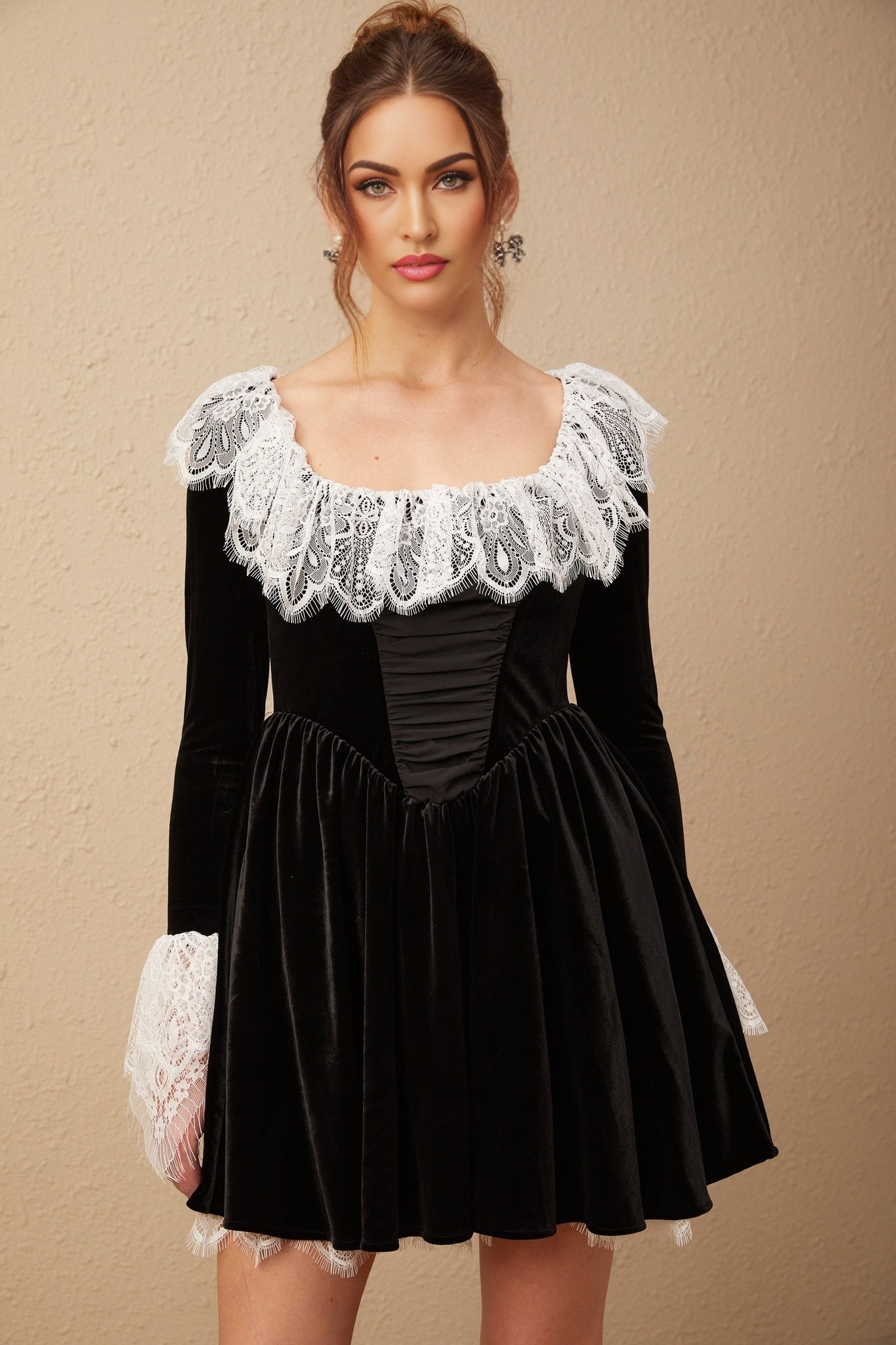 Black velvet mini dress with lace trim details named Fabiana