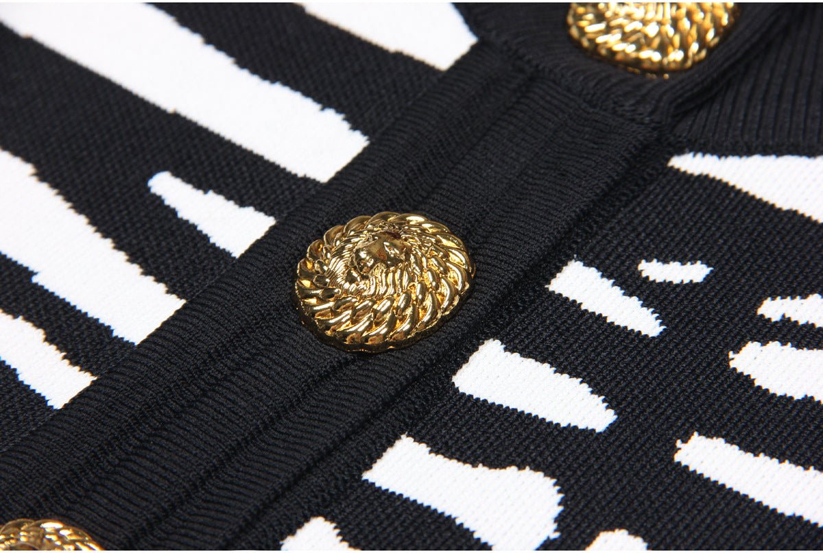 Black and white zebra print cropped cardigan with gold buttons