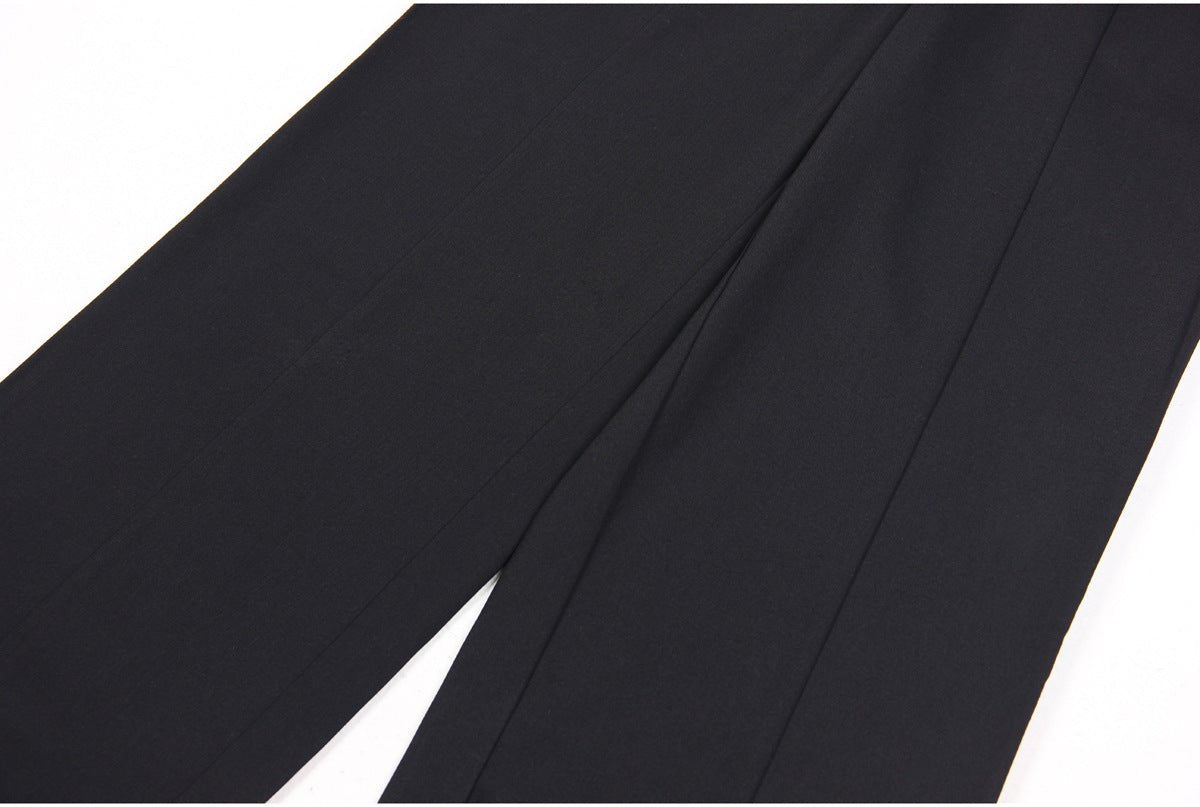 High-waisted black wide-leg pants with gold buttons