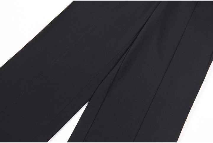 Black high-waisted wide-leg pants with gold buttons