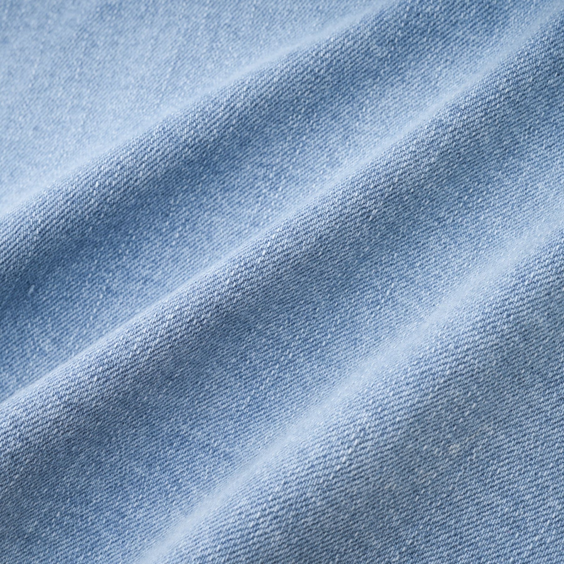 Blue denim skirt with ruffle hem called Capucine