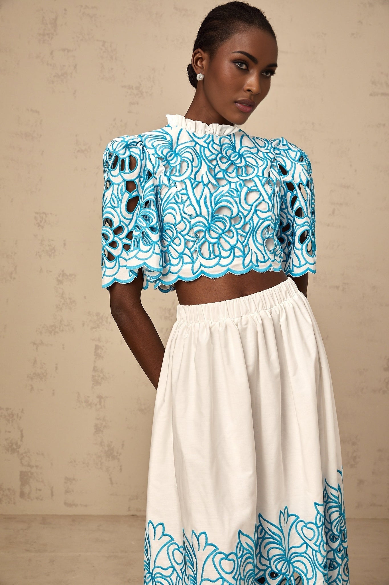 Blue embroidered matching top and skirt set with cut out details
