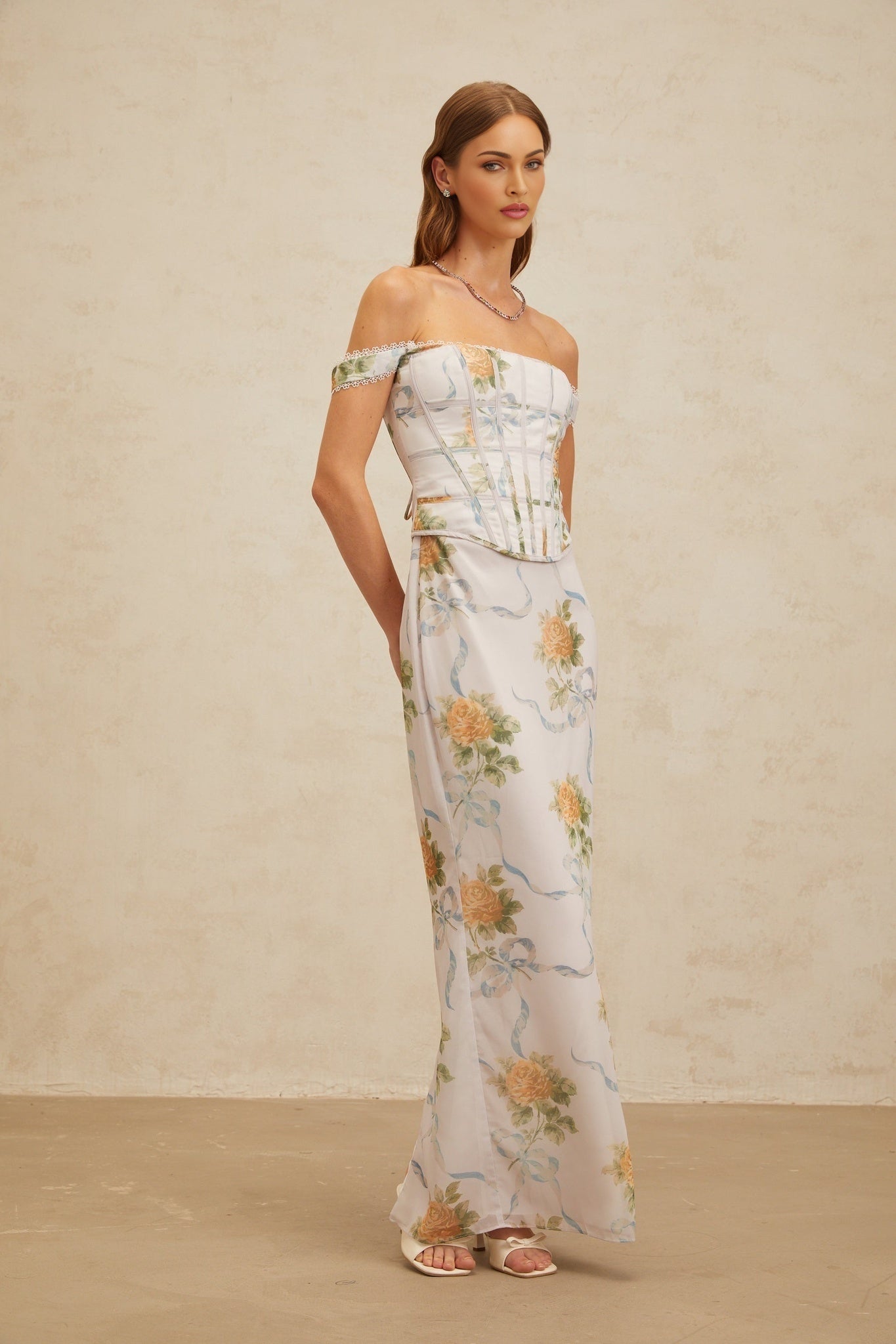 Blue floral print off the shoulder maxi dress with lace trim and decorative buttons