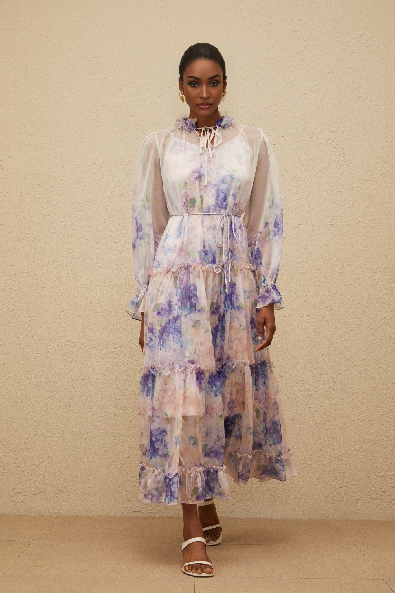 Blue floral print tiered midi dress with frilled neck and puff sleeves