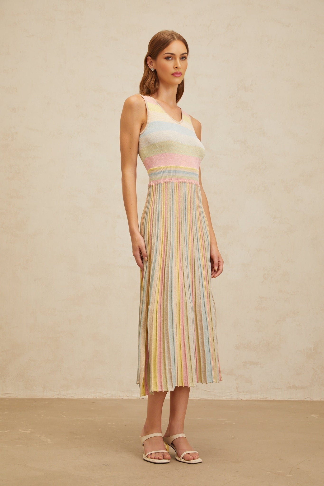 Blue striped sleeveless midi dress with pleated detailing and knitted construction